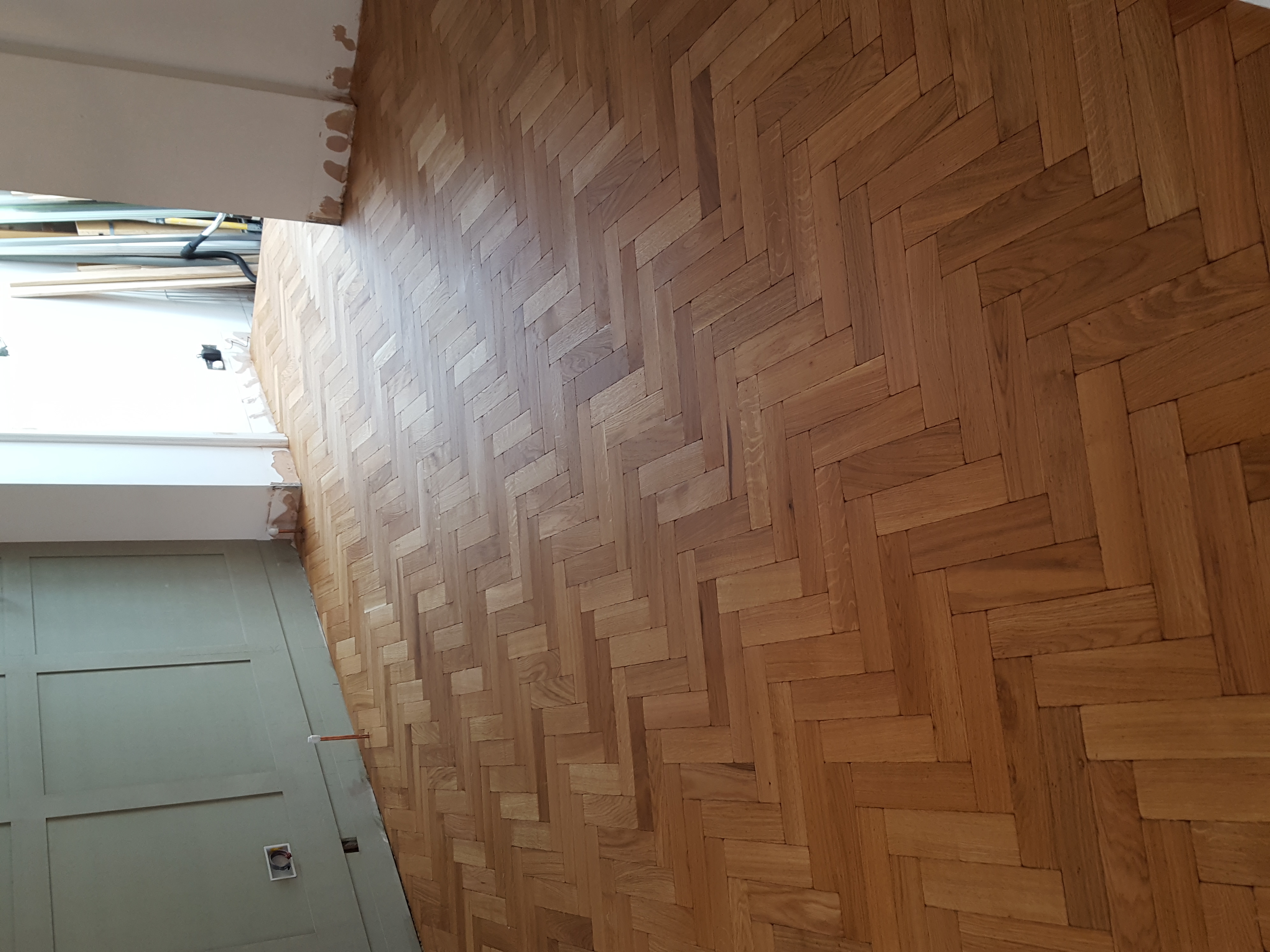 Parquet floor after sanding work in NW6