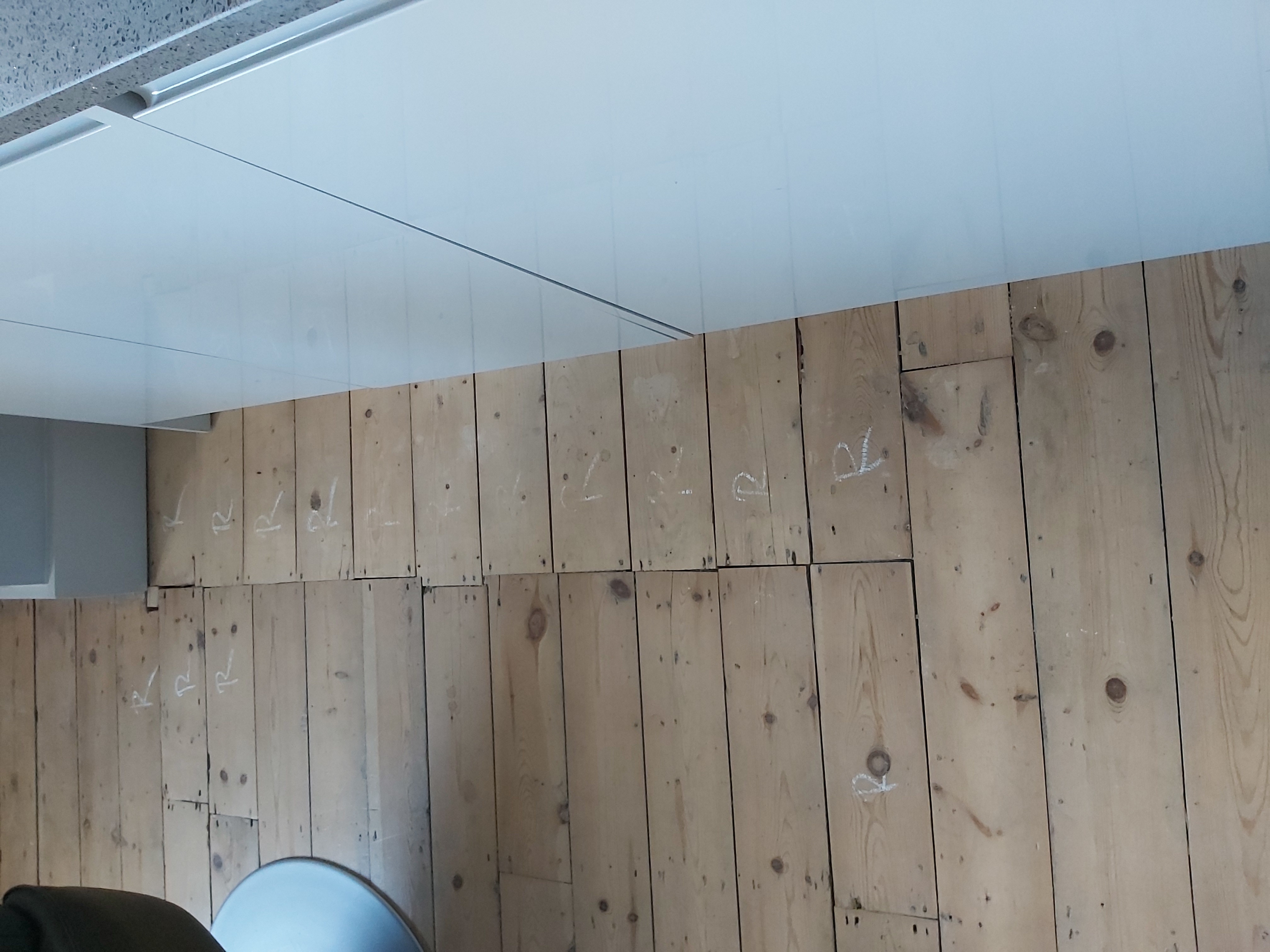 Floorboards floor after fitting work in NW6