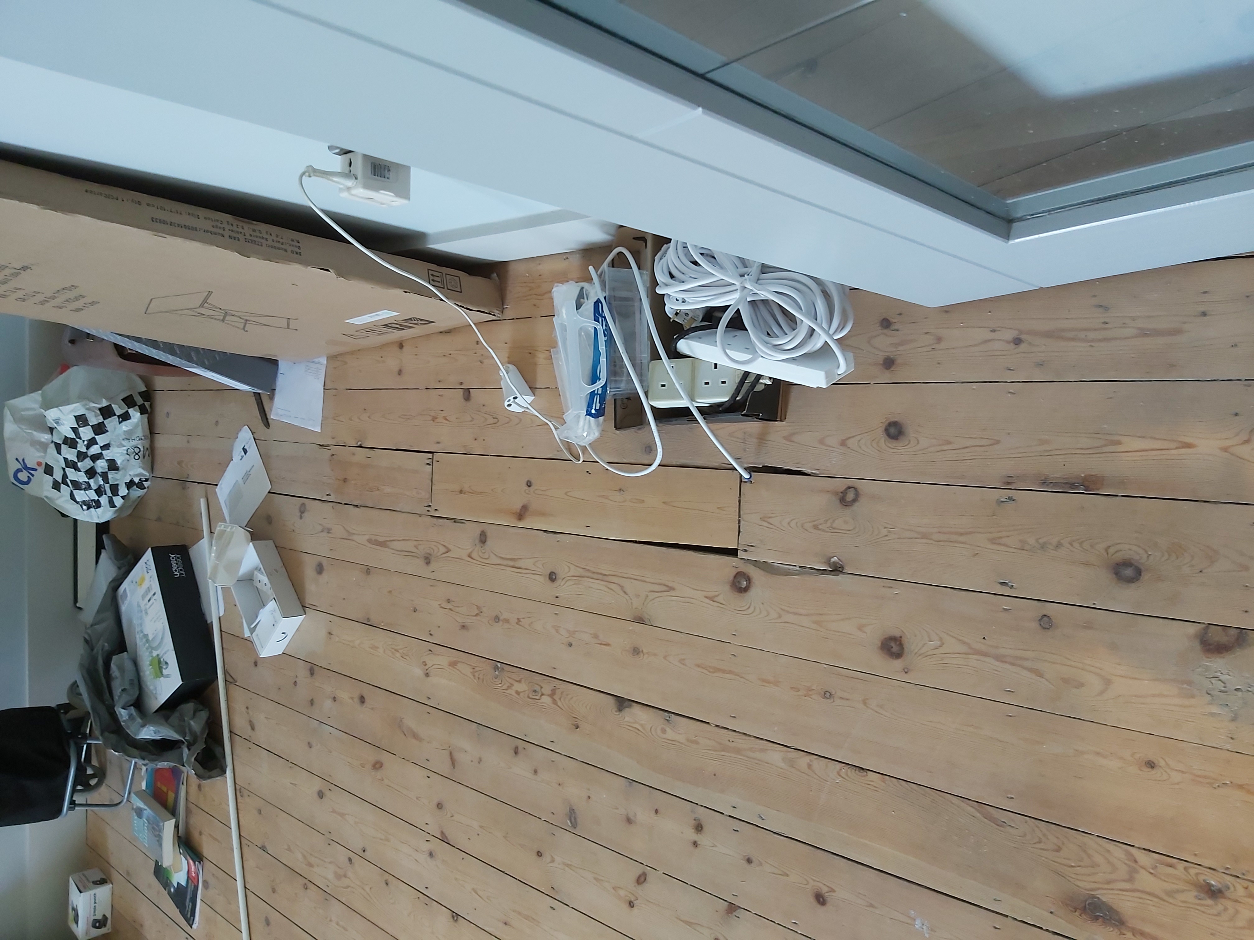 Floorboards floor after fitting work in NW6