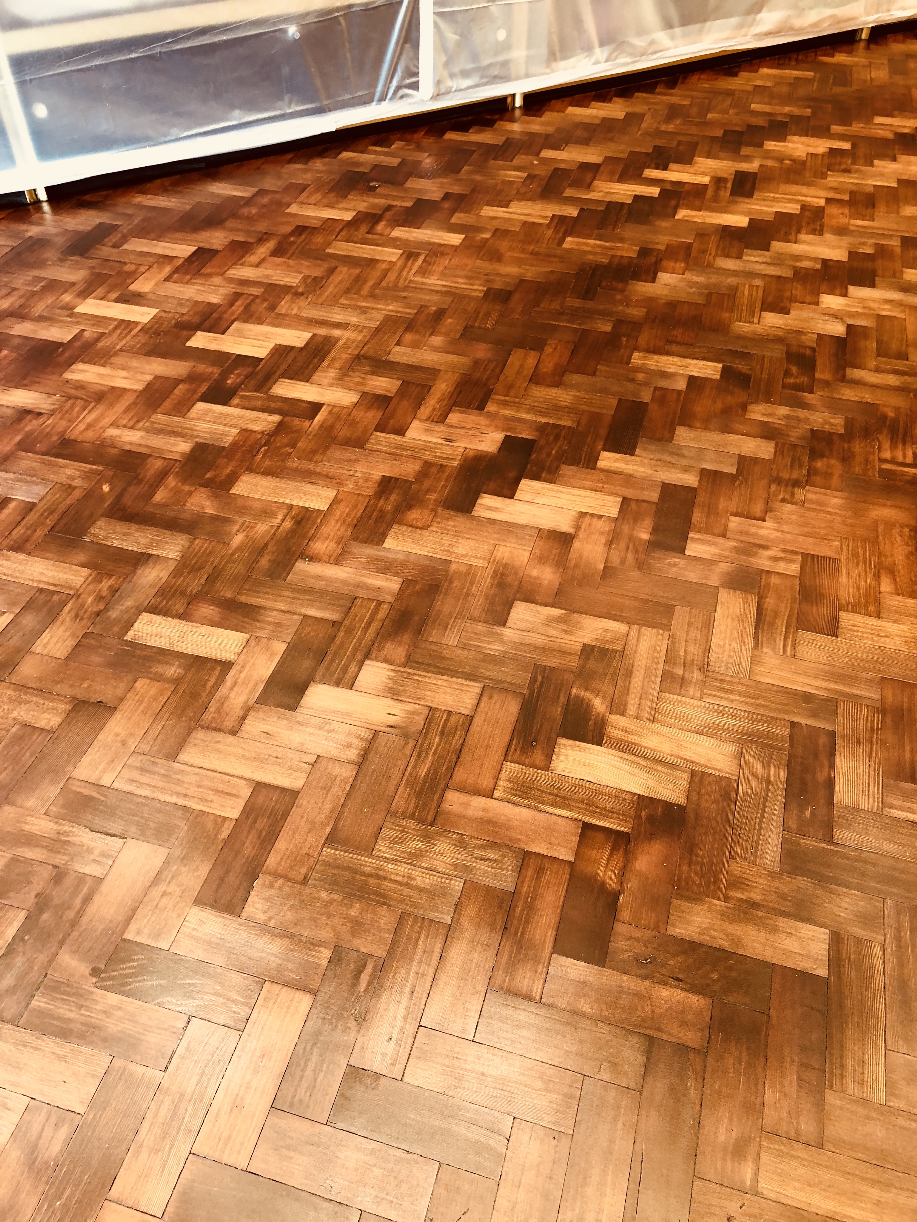 Parquet floor after sanding work in NW9