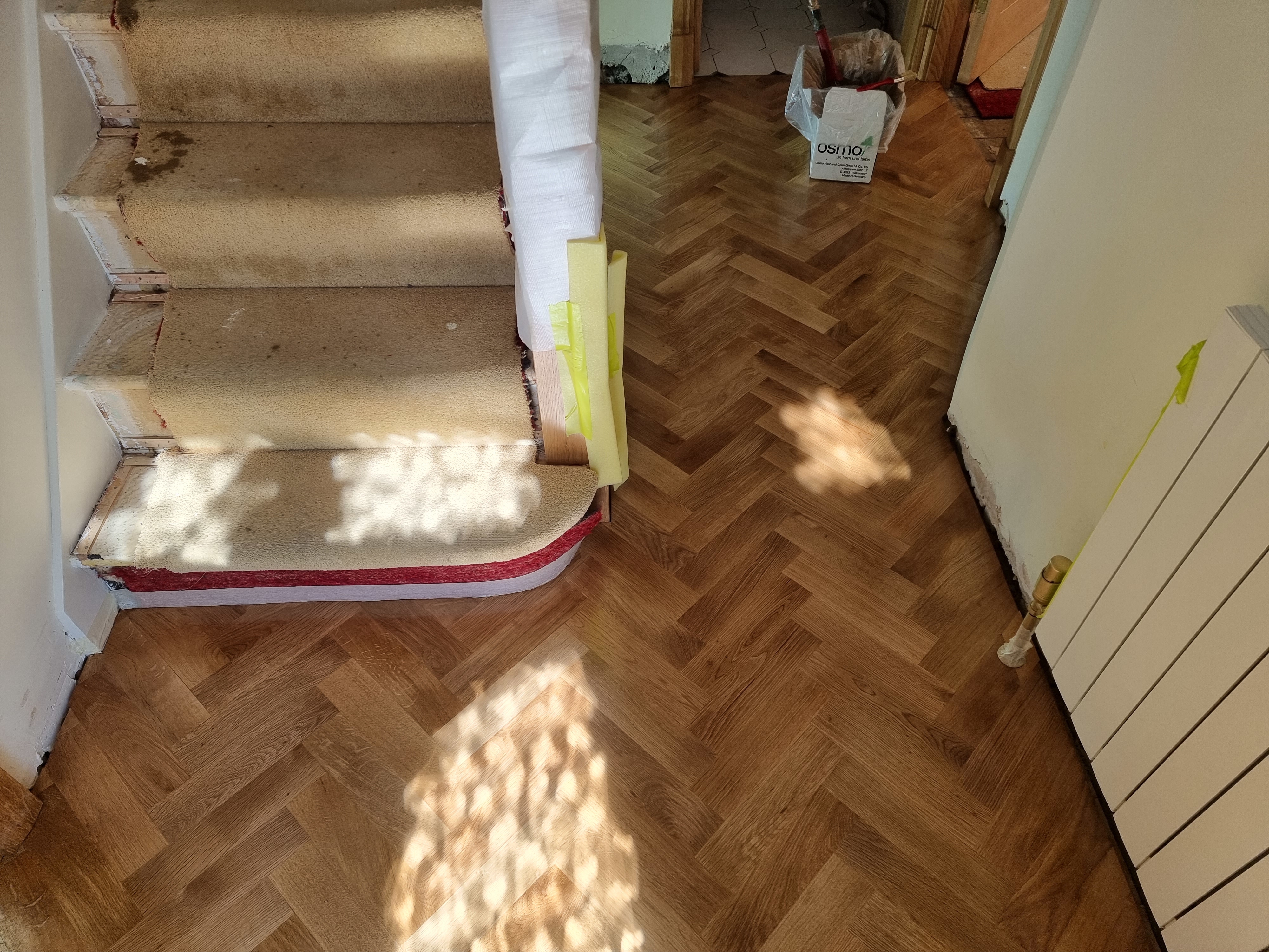 Parquet floor after sanding work in NW9