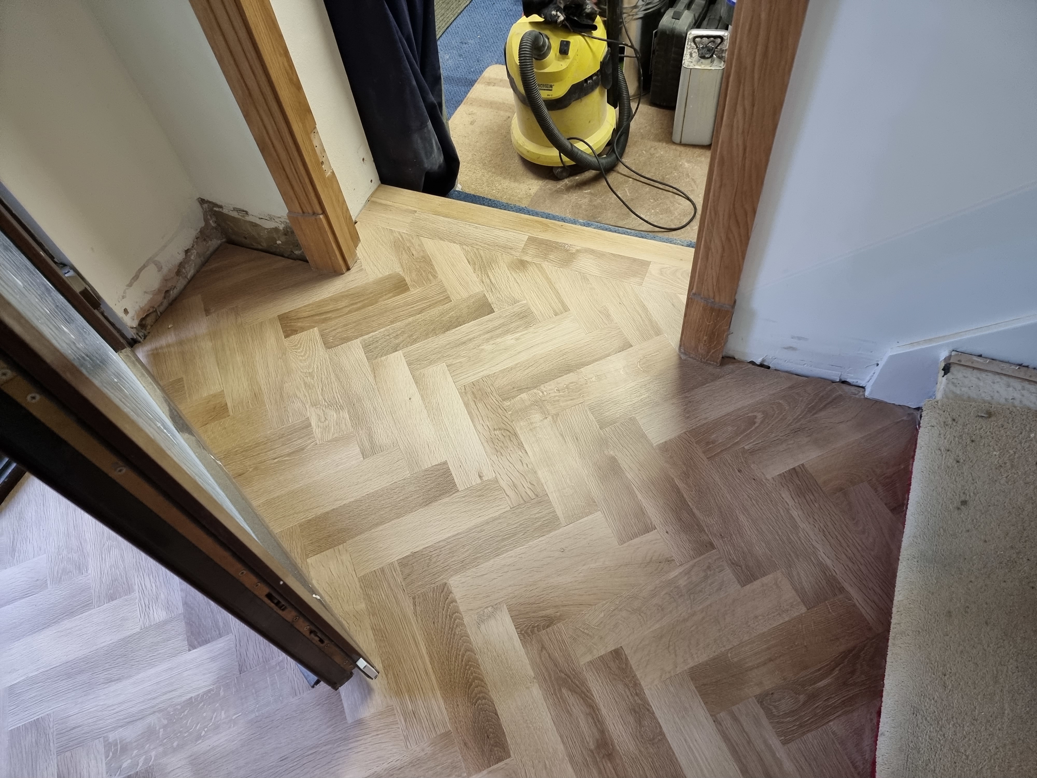 Parquet floor after sanding work in NW9
