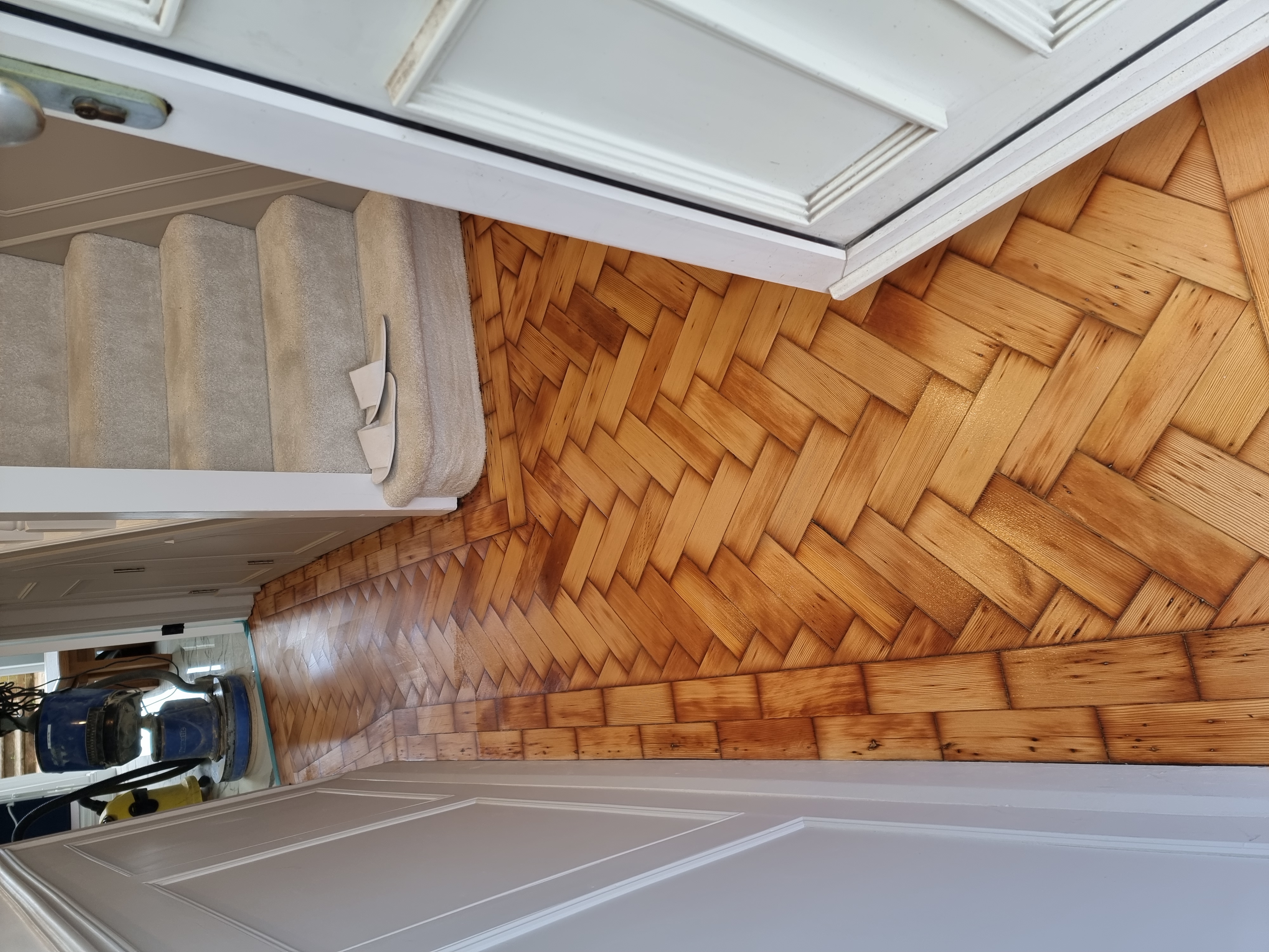 Parquet floor after sanding work in RM2