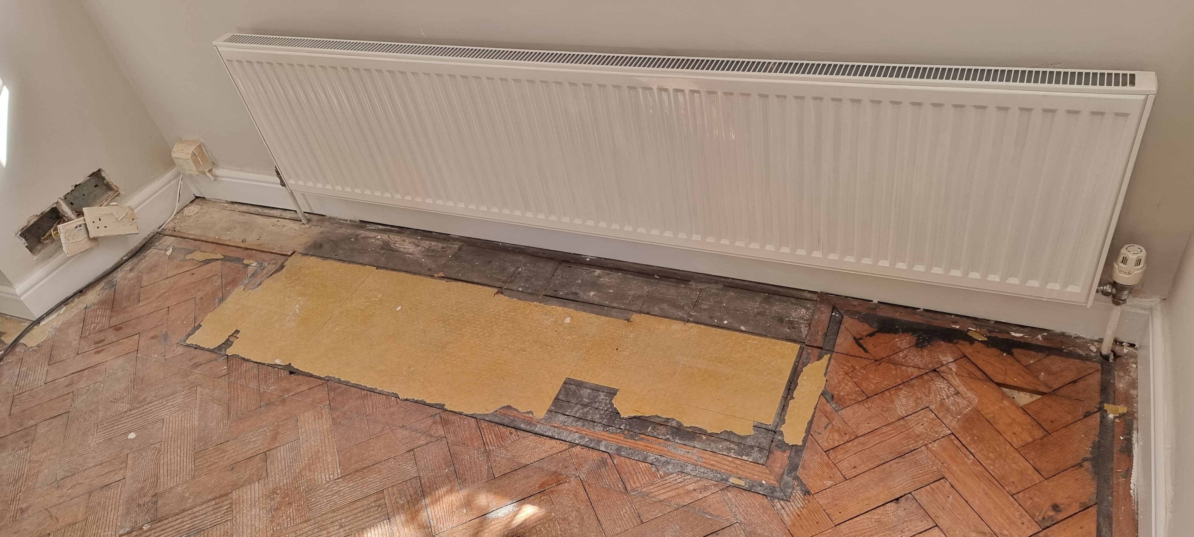 Parquet floor after sanding work in RM5