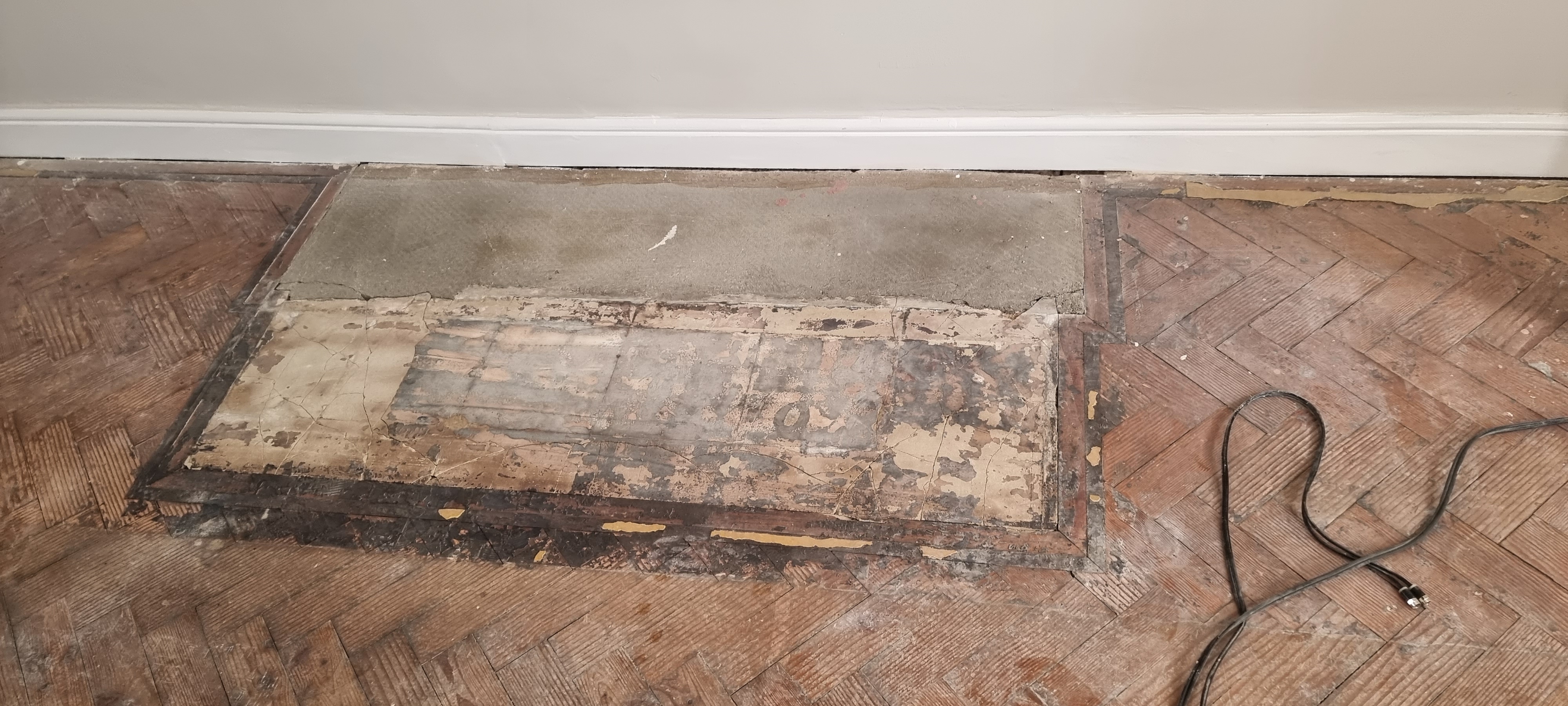 Parquet floor after sanding work in RM5