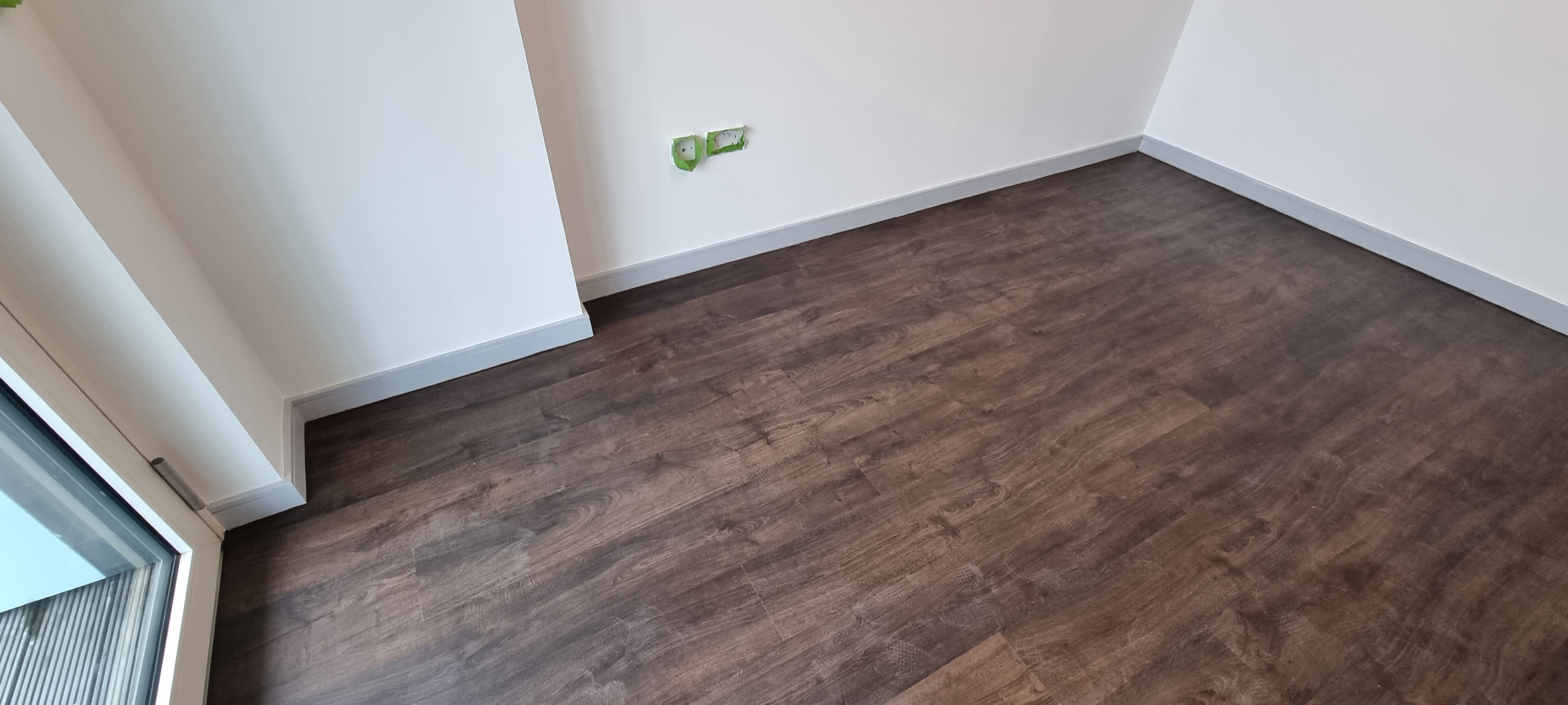 Laminate floor after fitting work in SE10