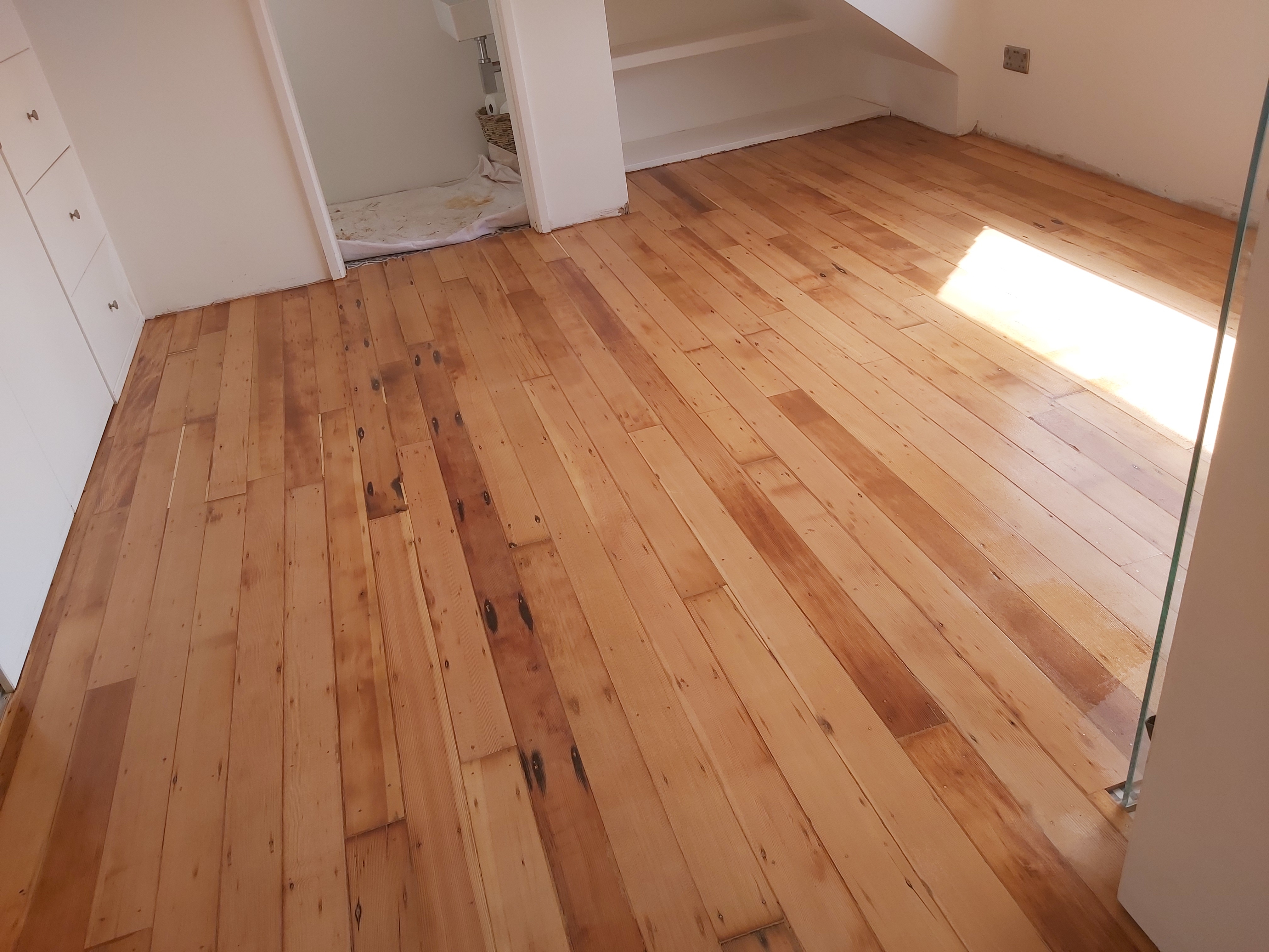 Floorboards floor after sanding work in SE1