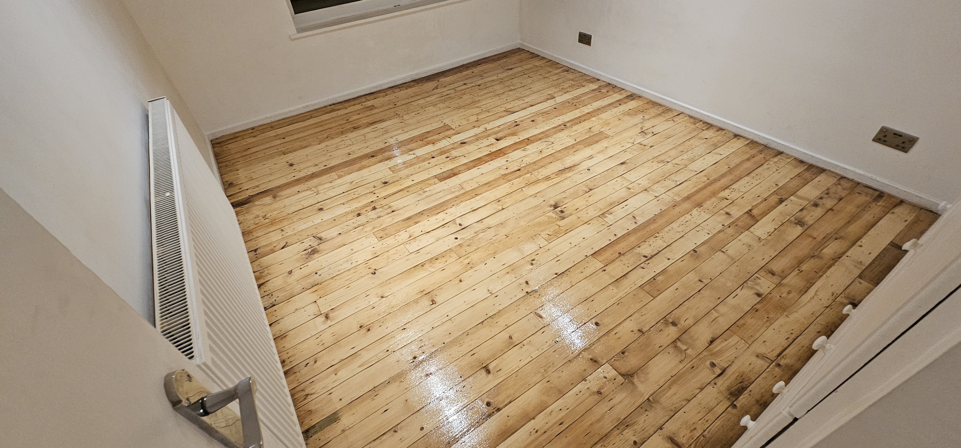 Floorboards floor after sanding work in SE1