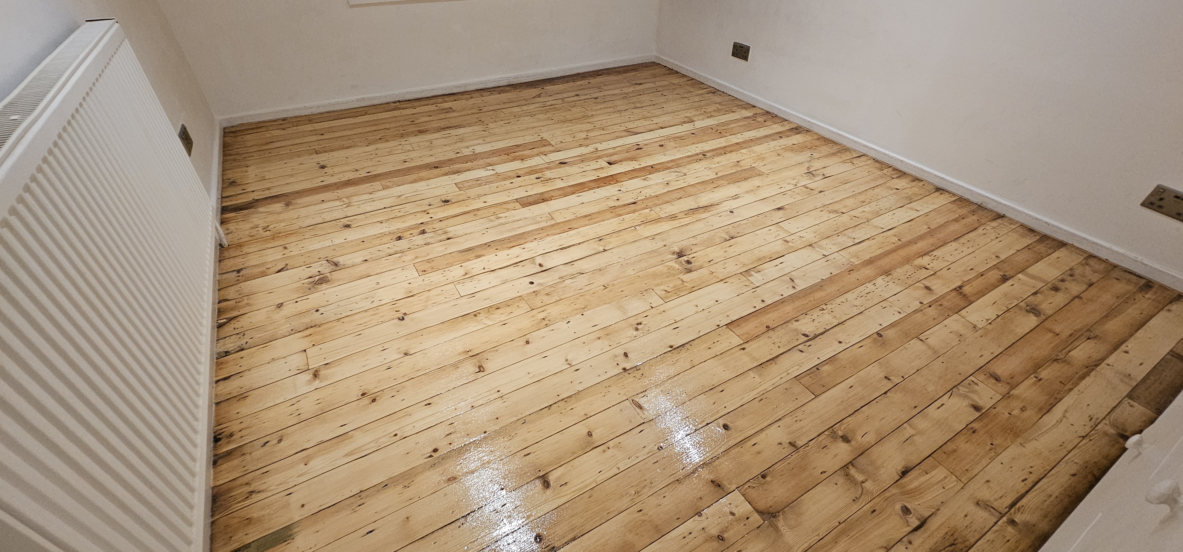 Floorboards floor after sanding work in SE1