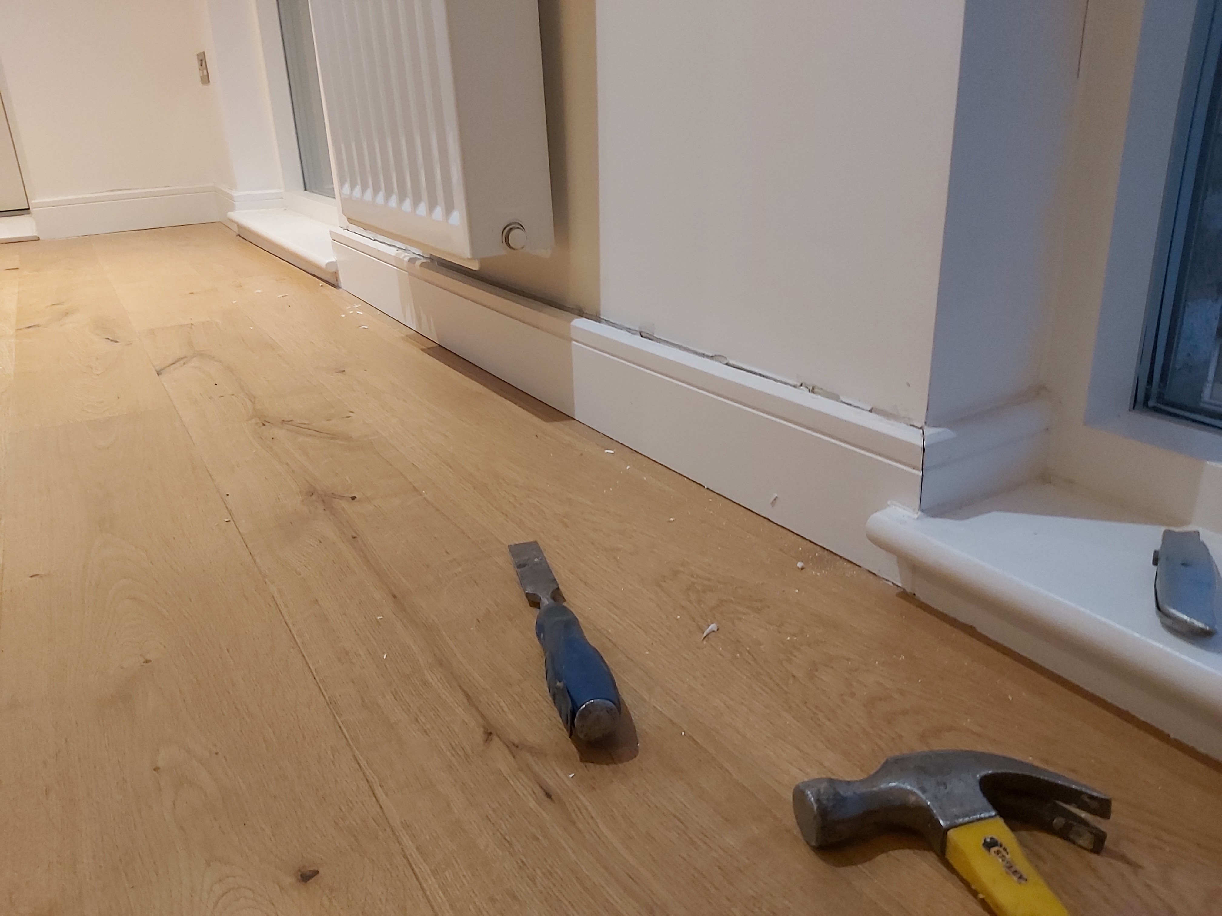 Engineered Wood floor after fitting work in SE17