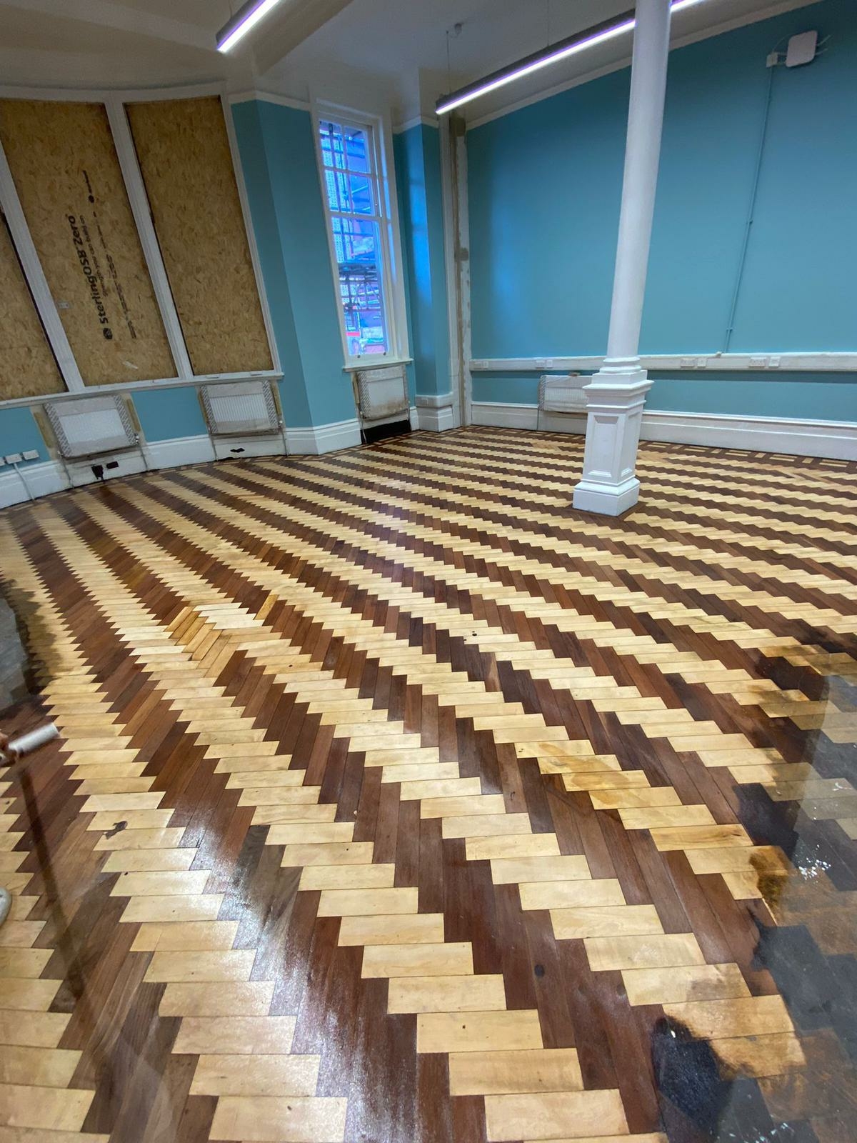 Parquet floor after sanding work in SE18