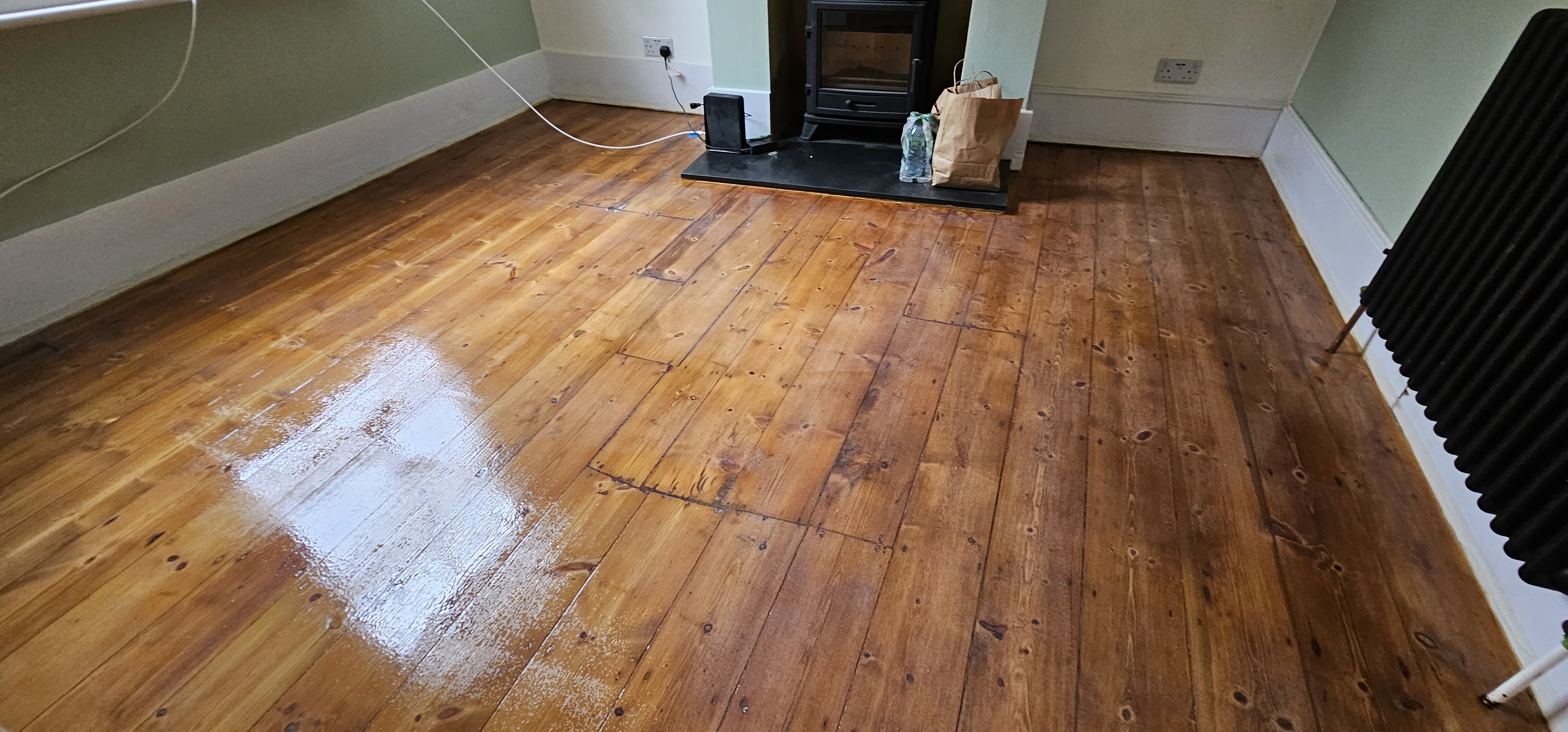 Floorboards floor after sanding work in SE18