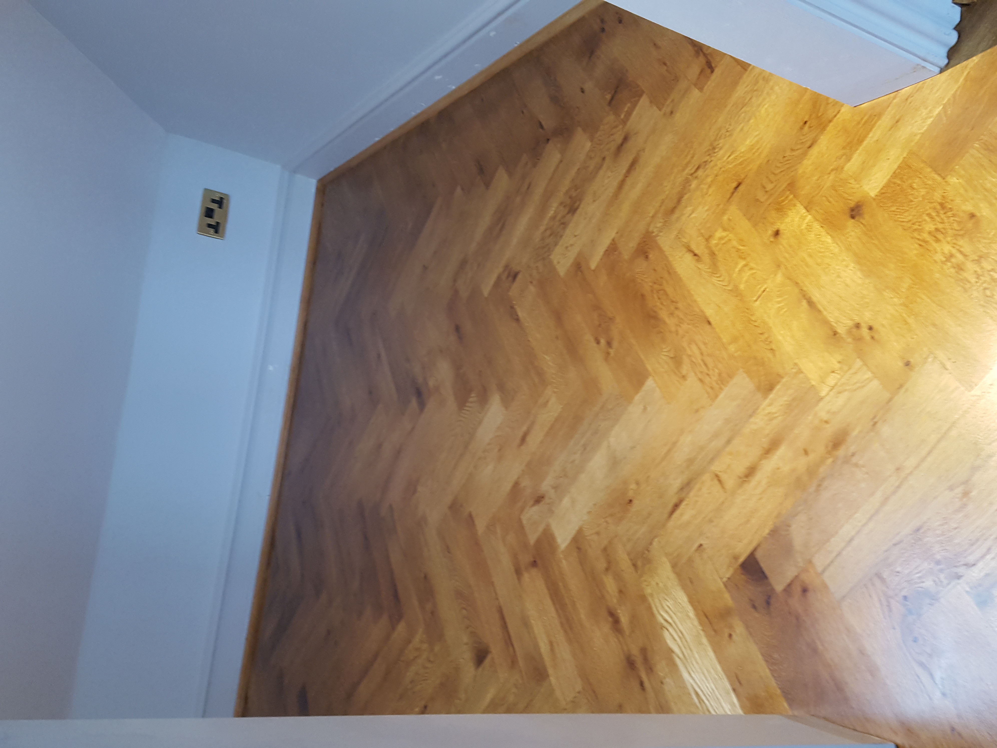 Parquet floor after sanding work in SE19