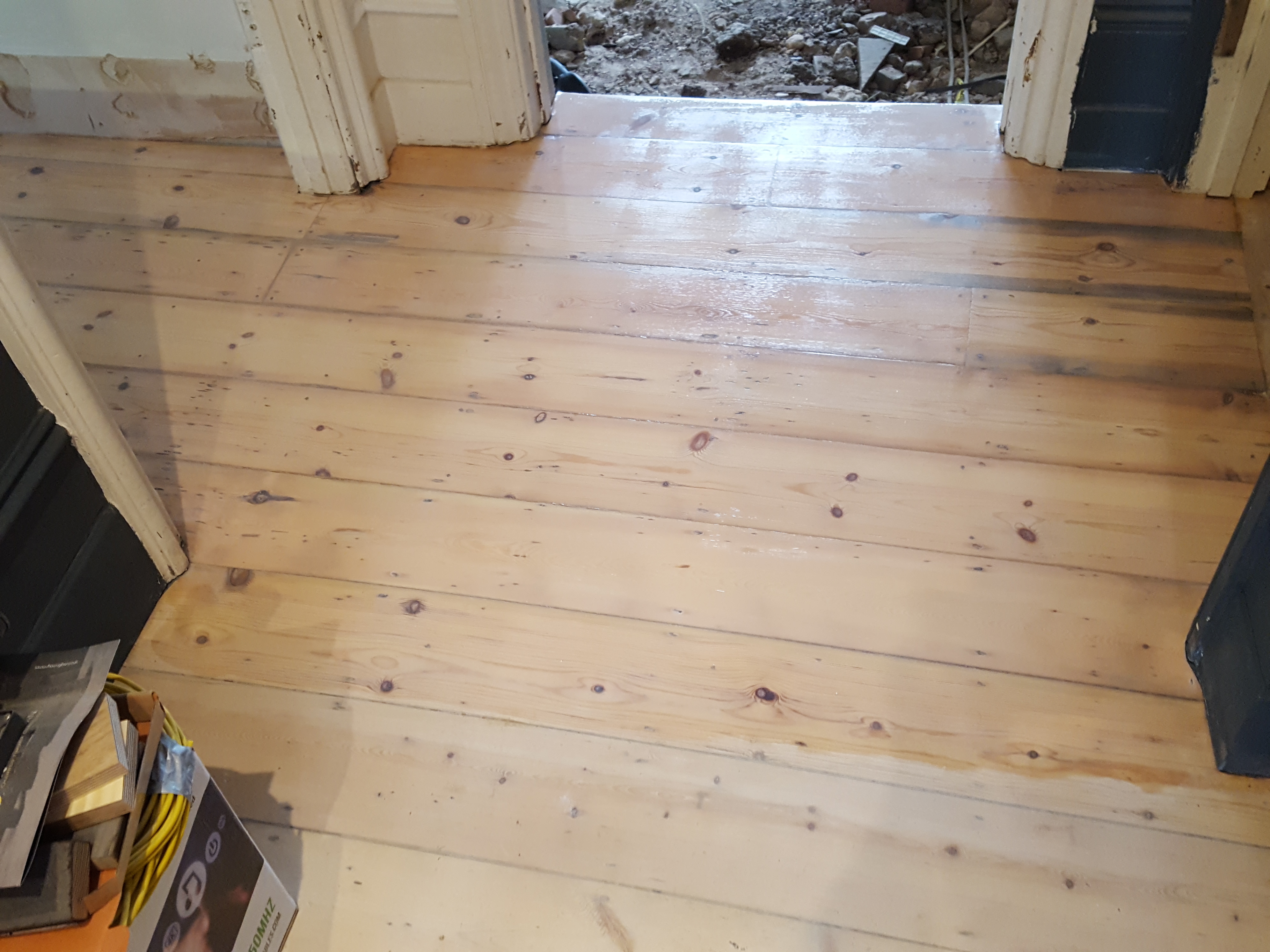 Floorboards floor after sanding work in SE22