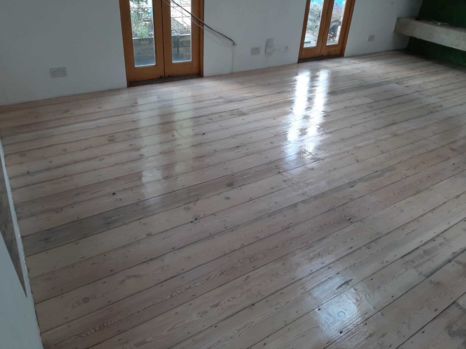 Floorboards floor after sanding work in SE22