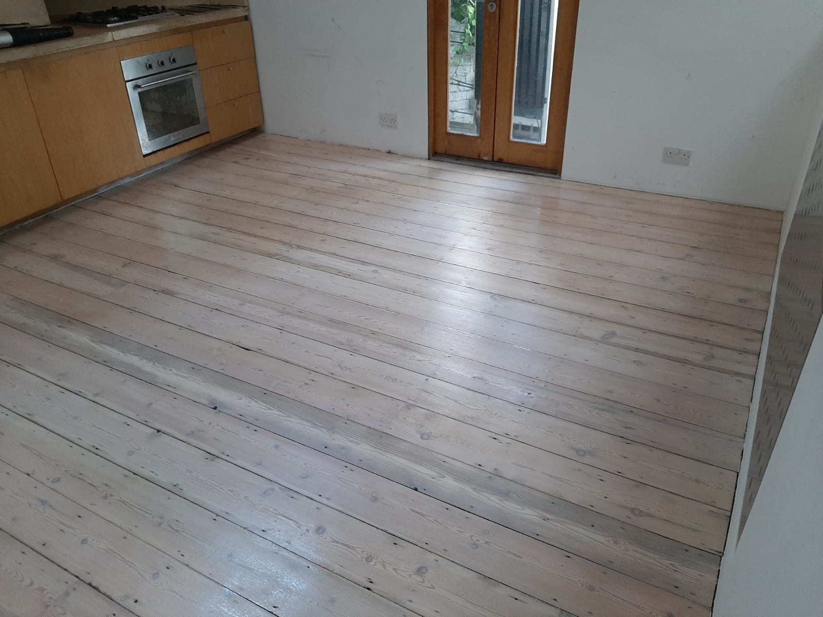 Floorboards floor after sanding work in SE22