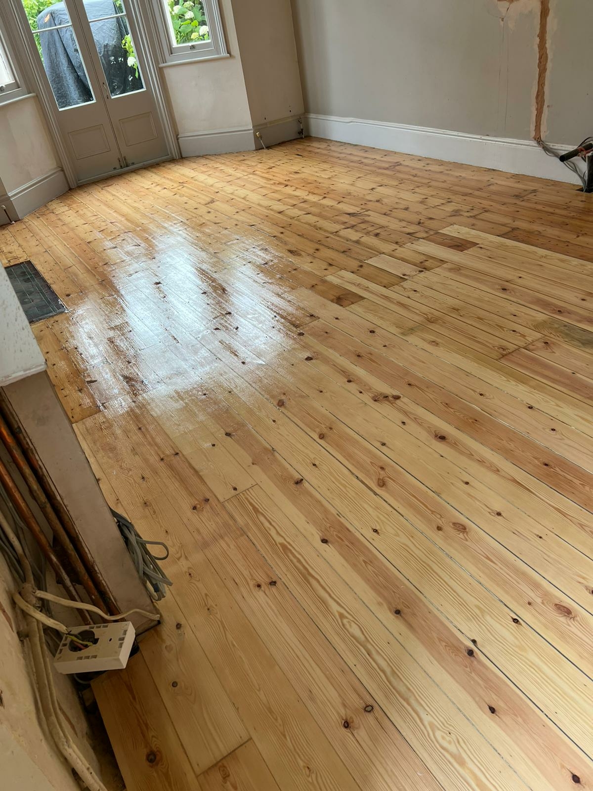 Floorboards floor after sanding work in SE25