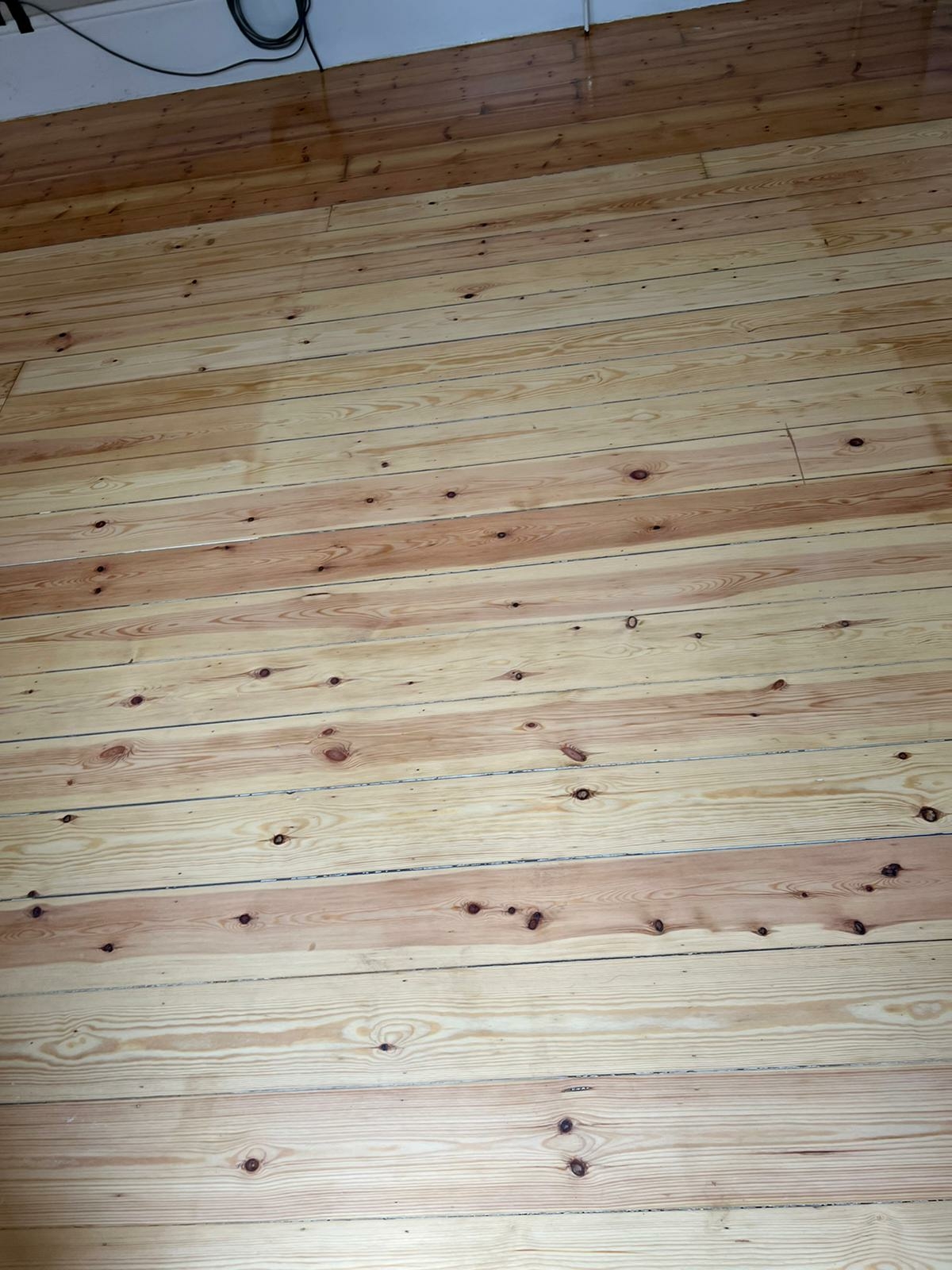 Floorboards floor after sanding work in SE25