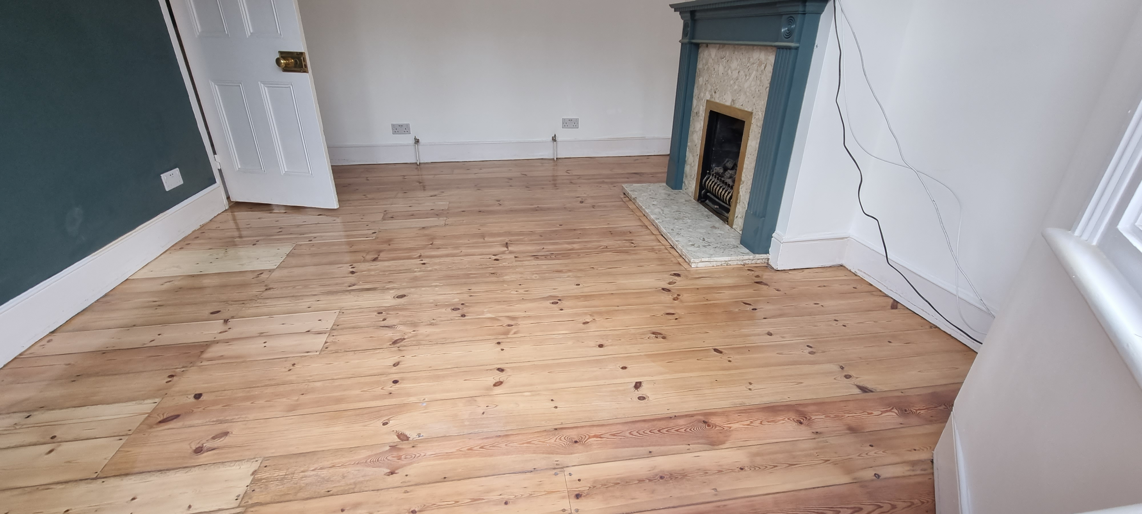 Floorboards floor after sanding work in SE25
