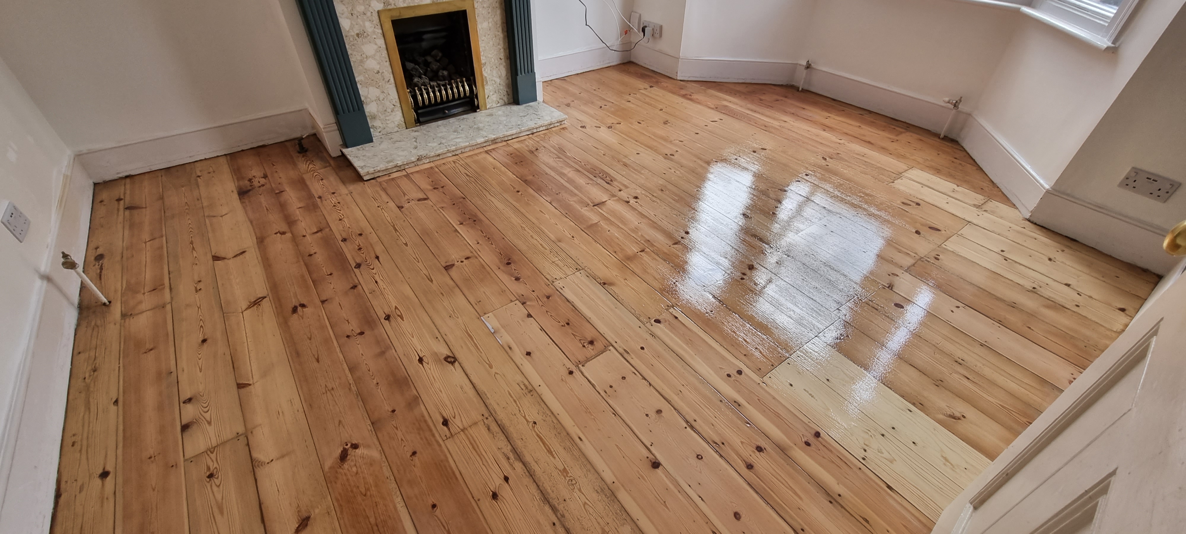 Floorboards floor after sanding work in SE25