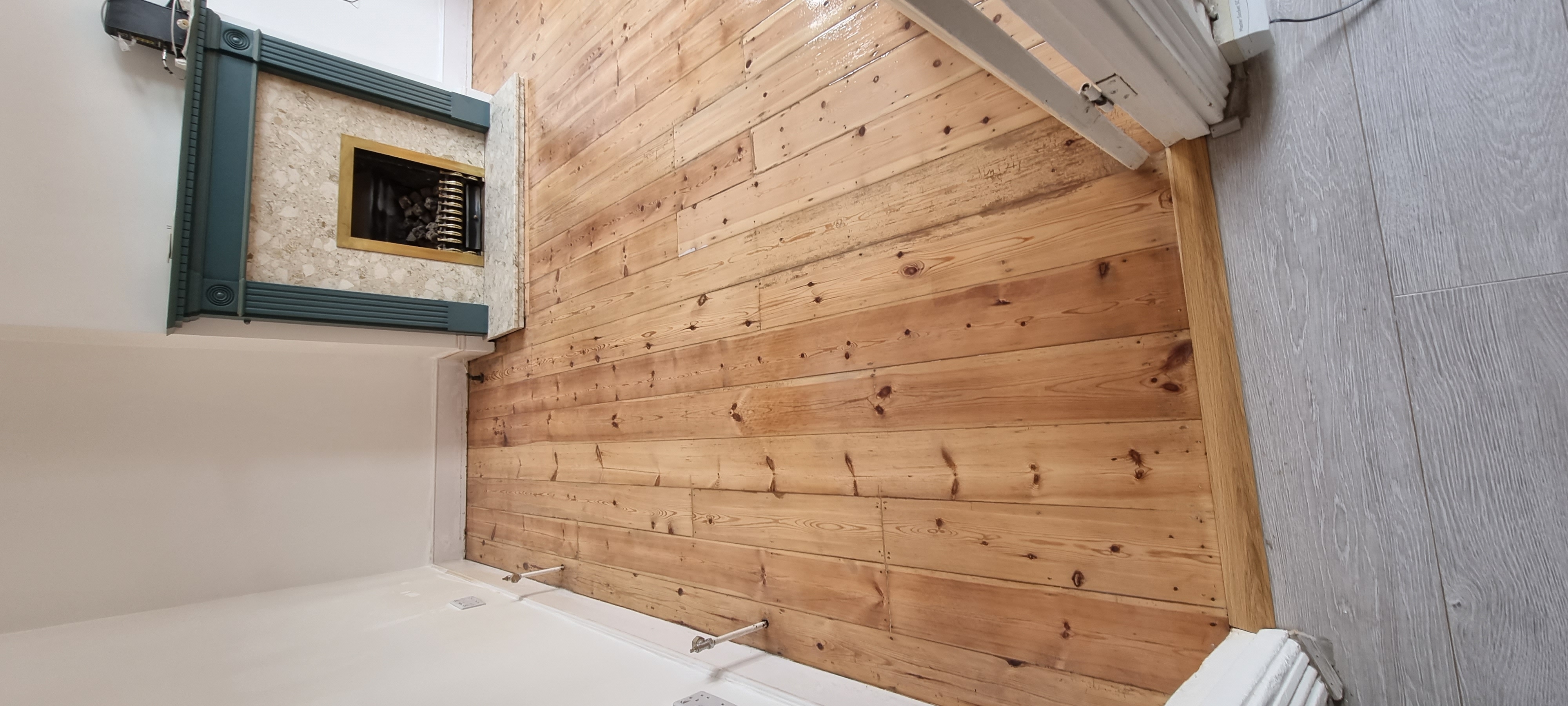 Floorboards floor after sanding work in SE25