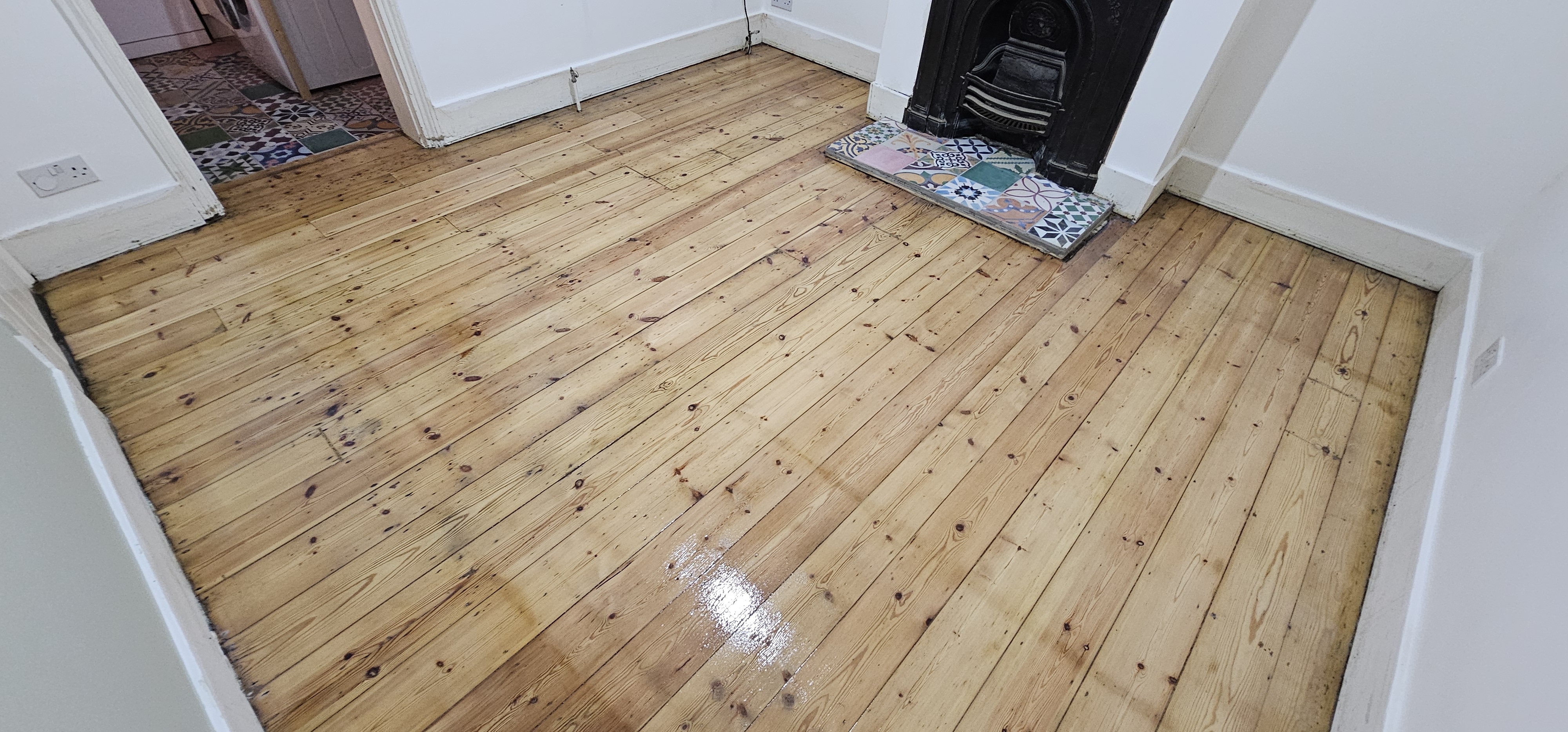 Floorboards floor after sanding work in SE25
