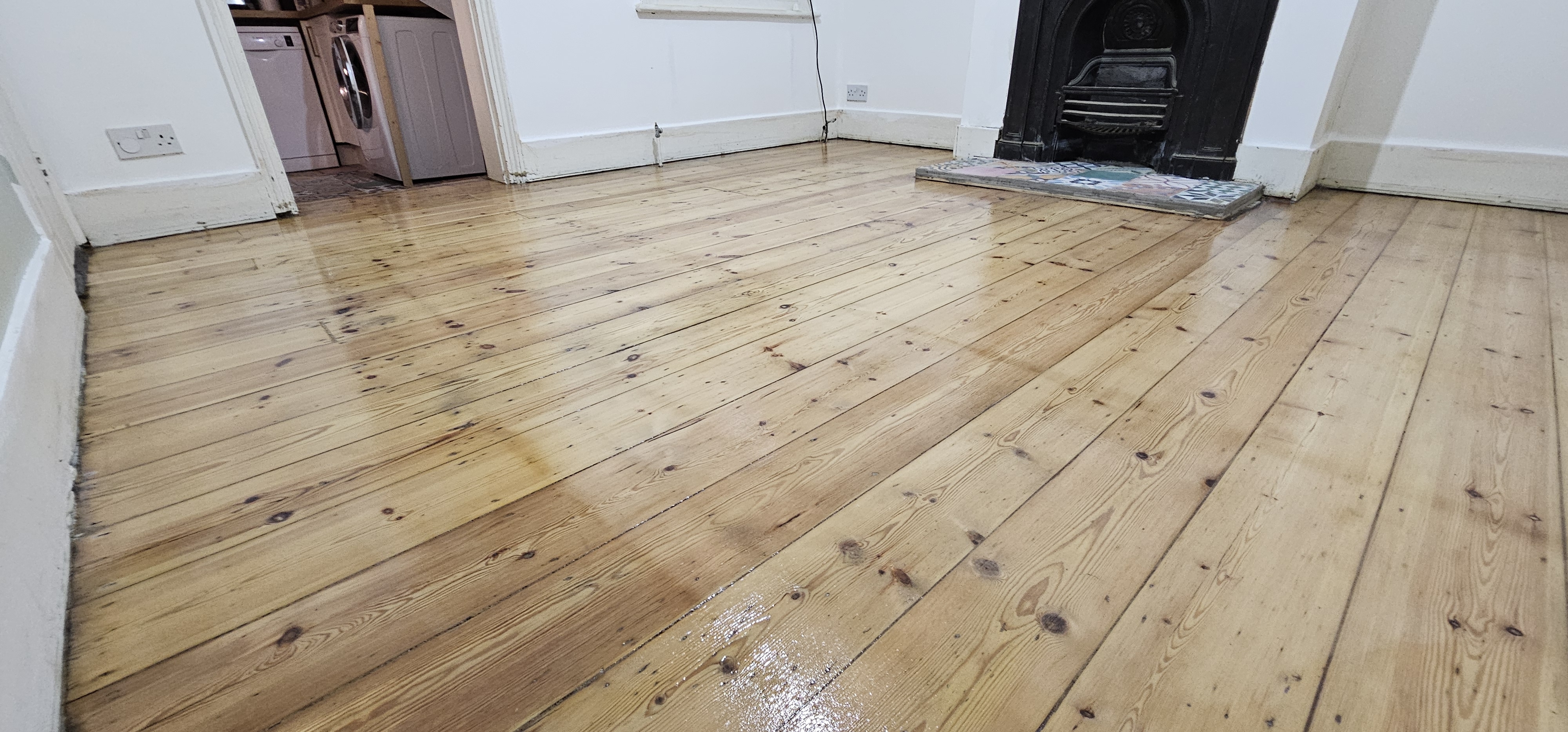 Floorboards floor after sanding work in SE25