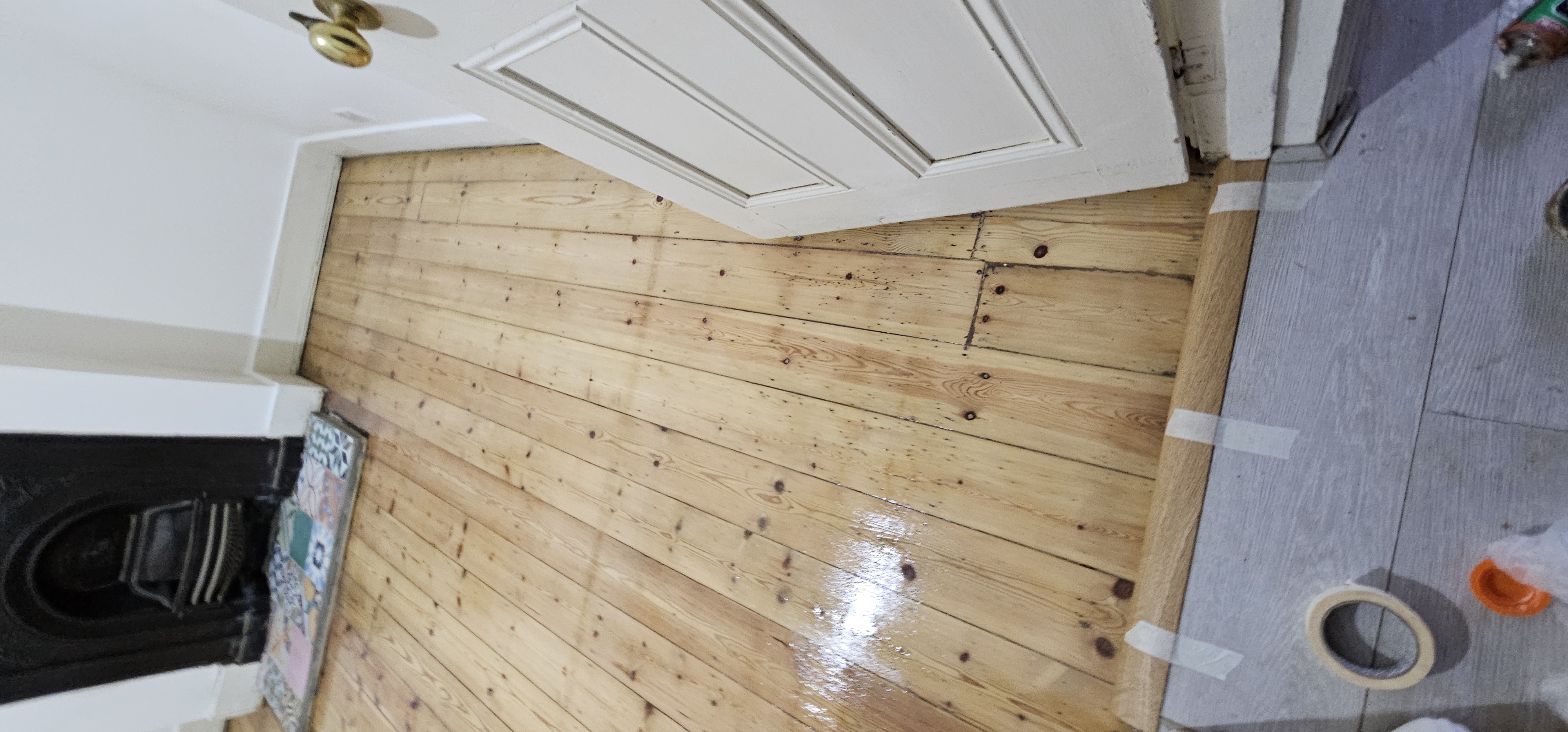 Floorboards floor after sanding work in SE25