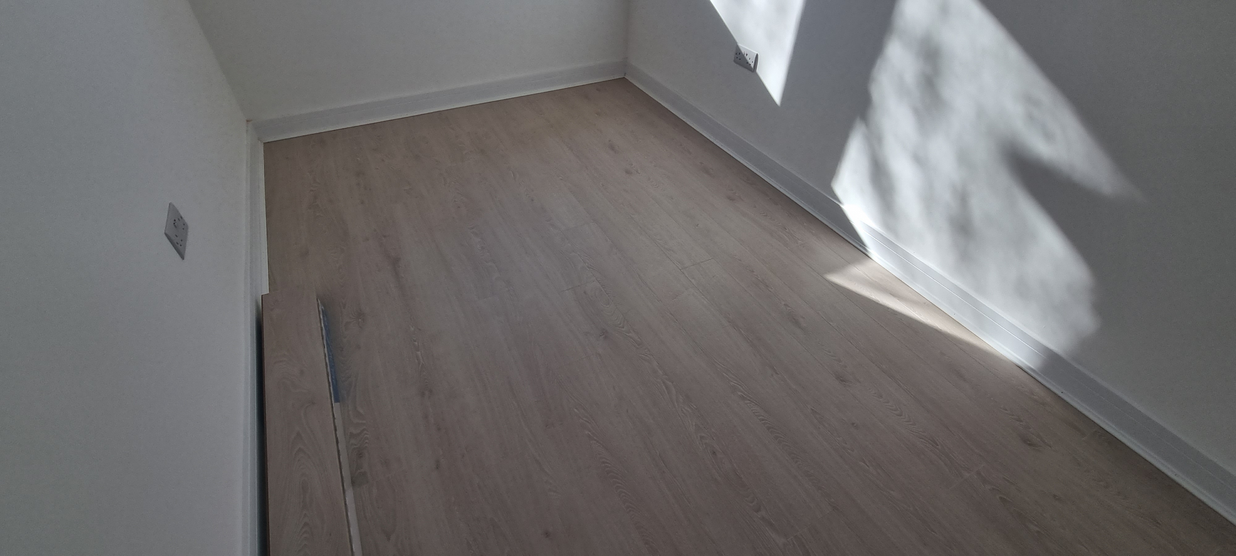 Laminate floor after fitting work in SE25