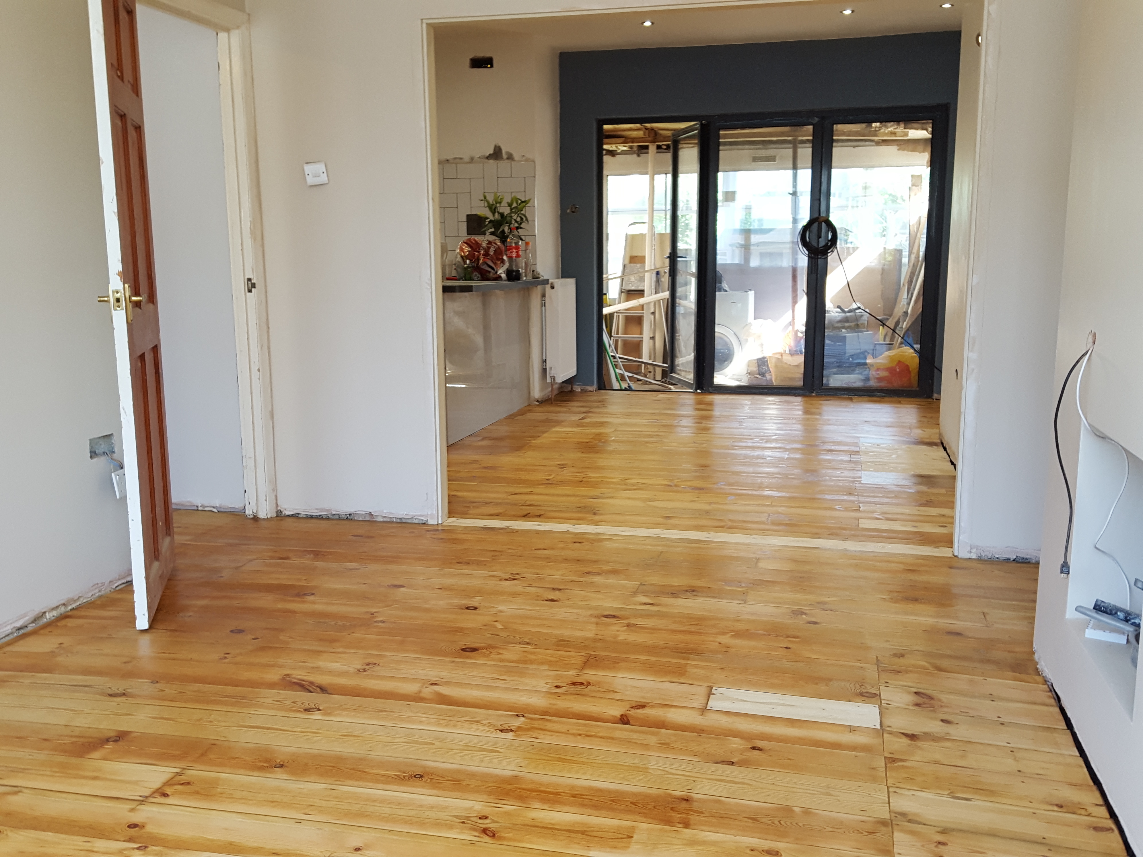 Floorboards floor after sanding work in SE25