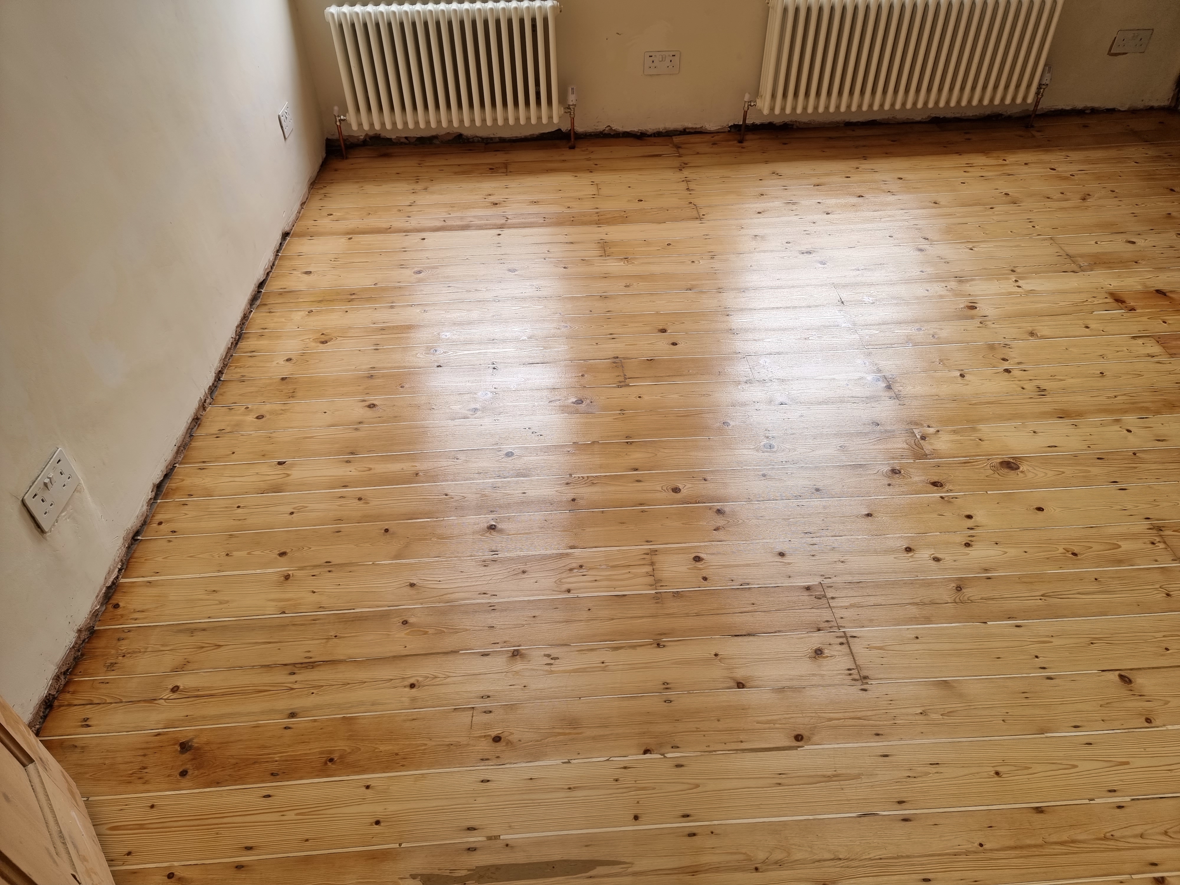 Floorboards floor after sanding work in SE4