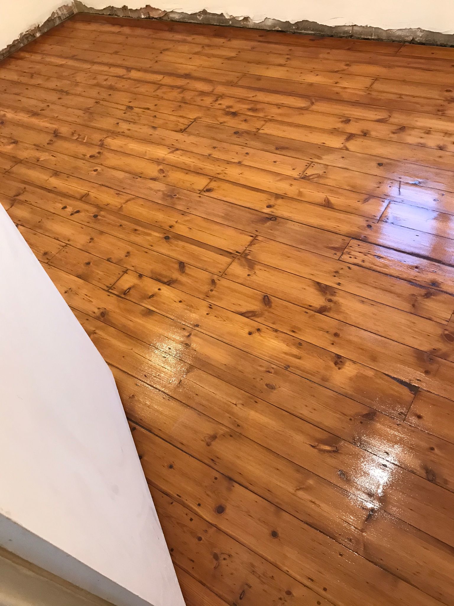 Floorboards floor after sanding work in SE9