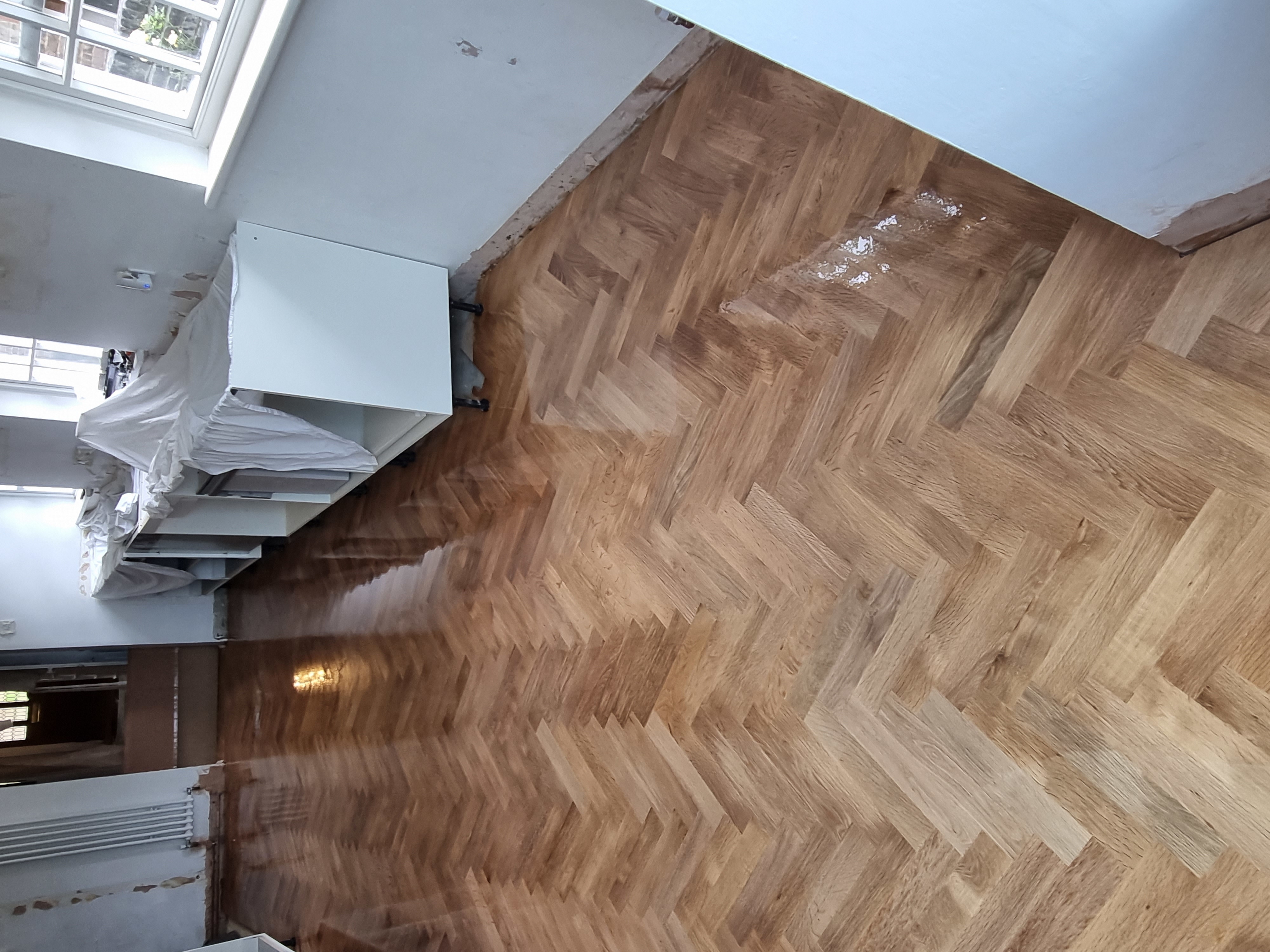 Parquet floor after sanding work in SL4