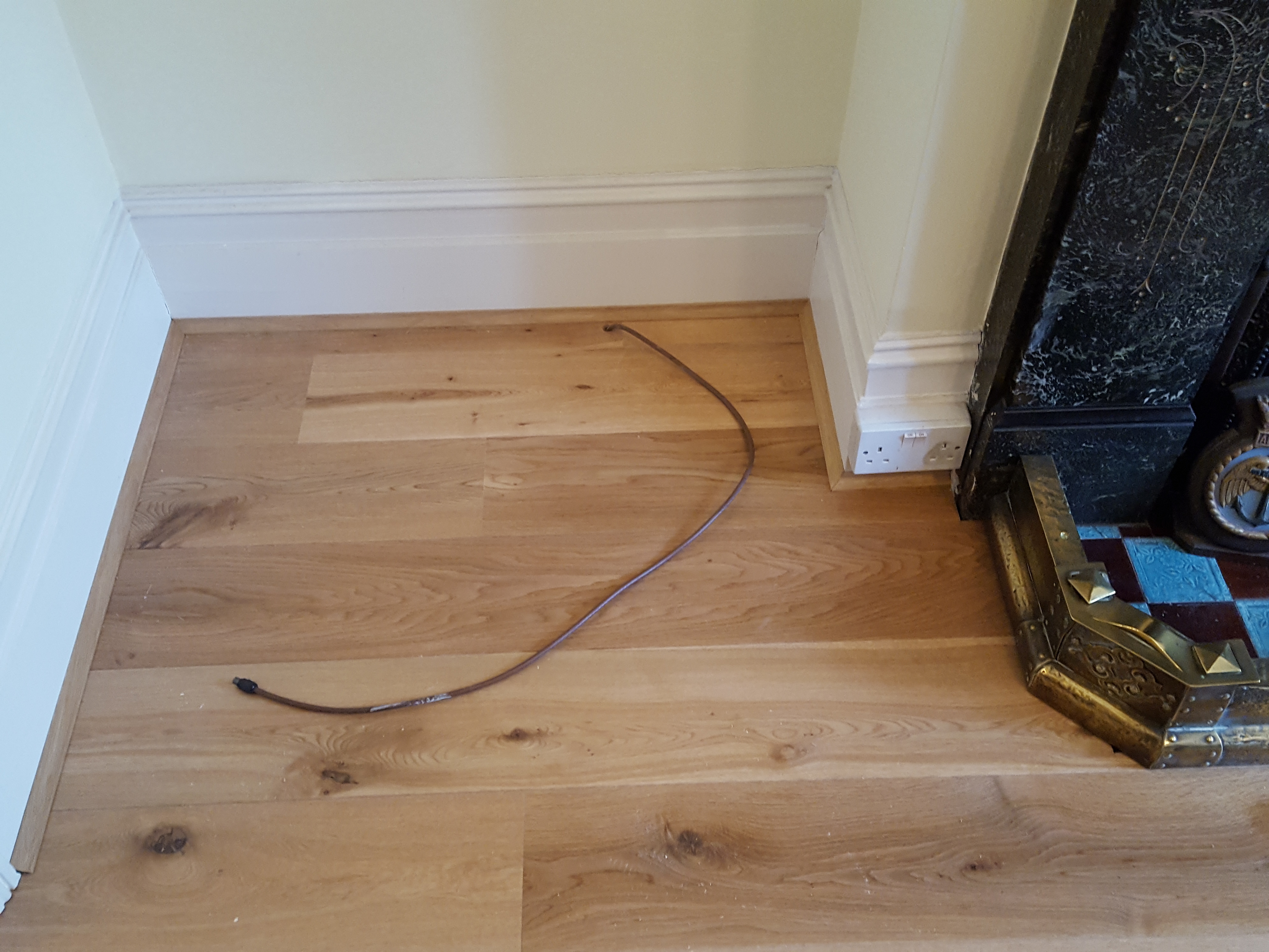 Engineered Wood floor after fitting work in SW11