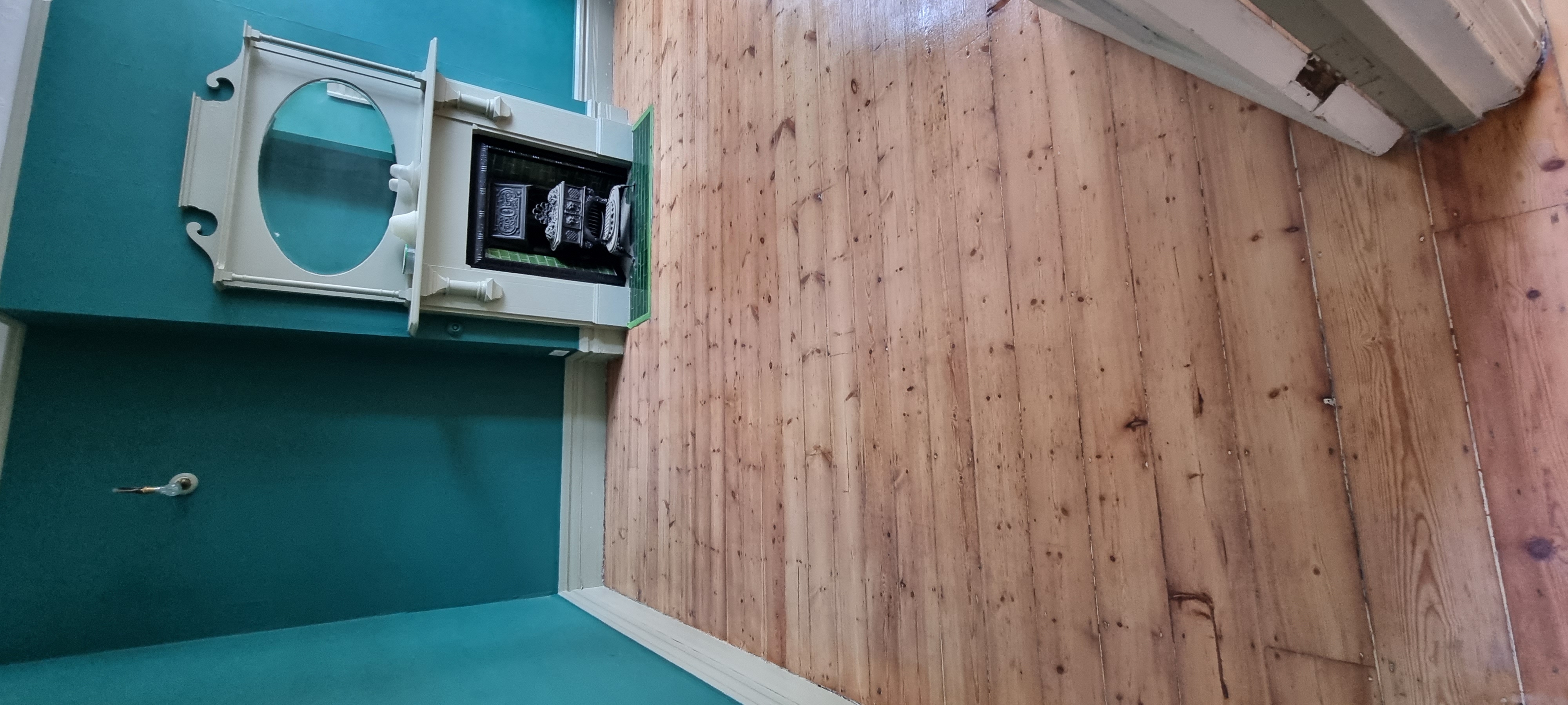 Floorboards floor after sanding work in SW12