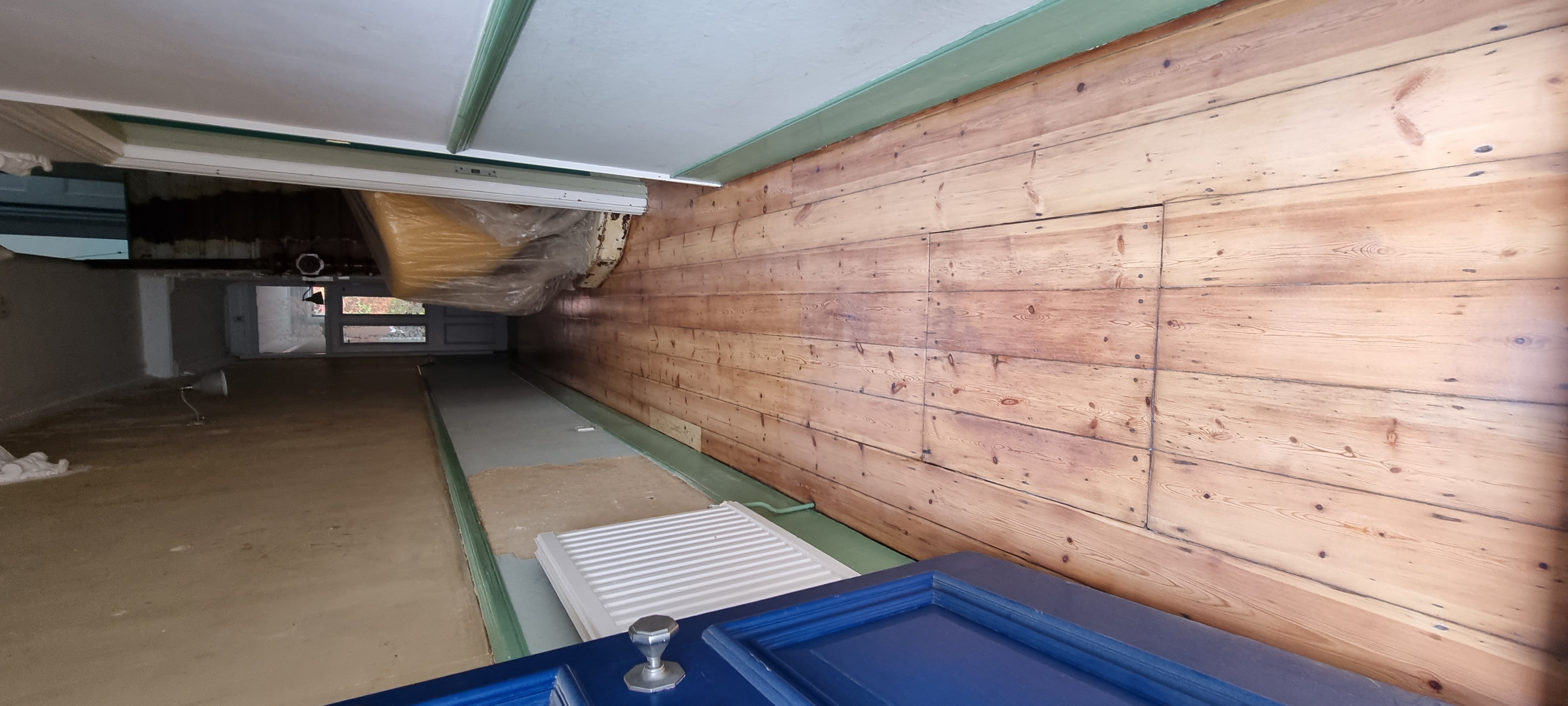 Floorboards floor after sanding work in SW12