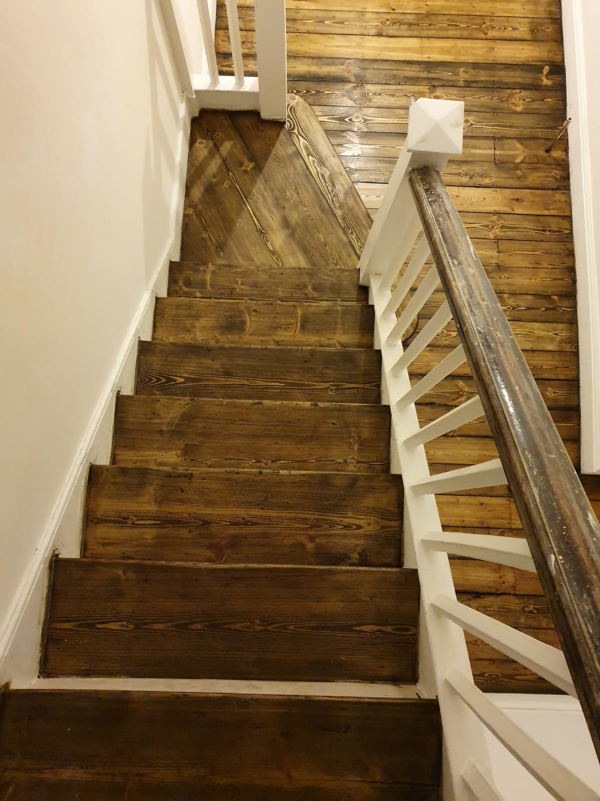Floorboards floor after sanding work in SW12