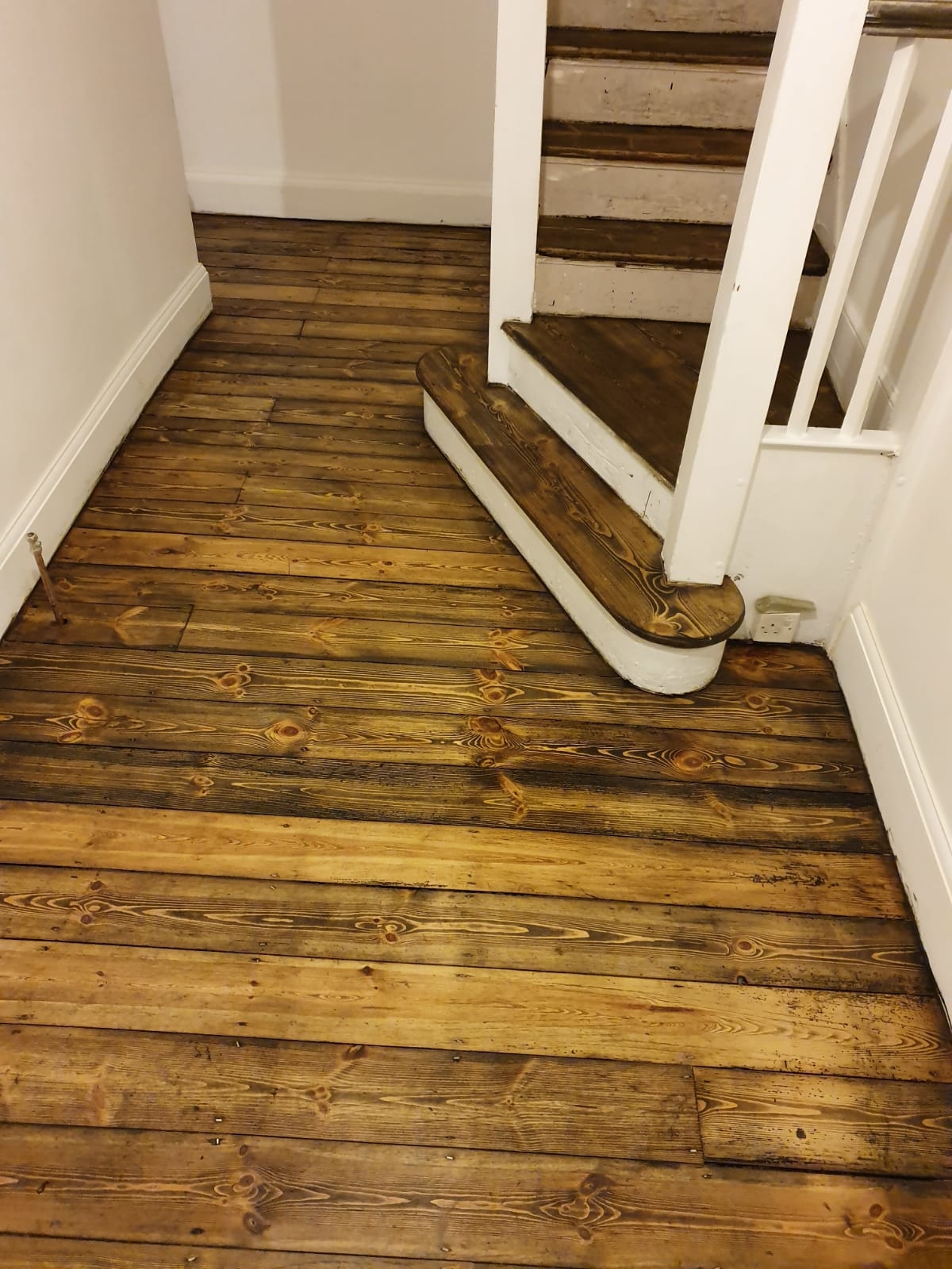Floorboards floor after sanding work in SW12
