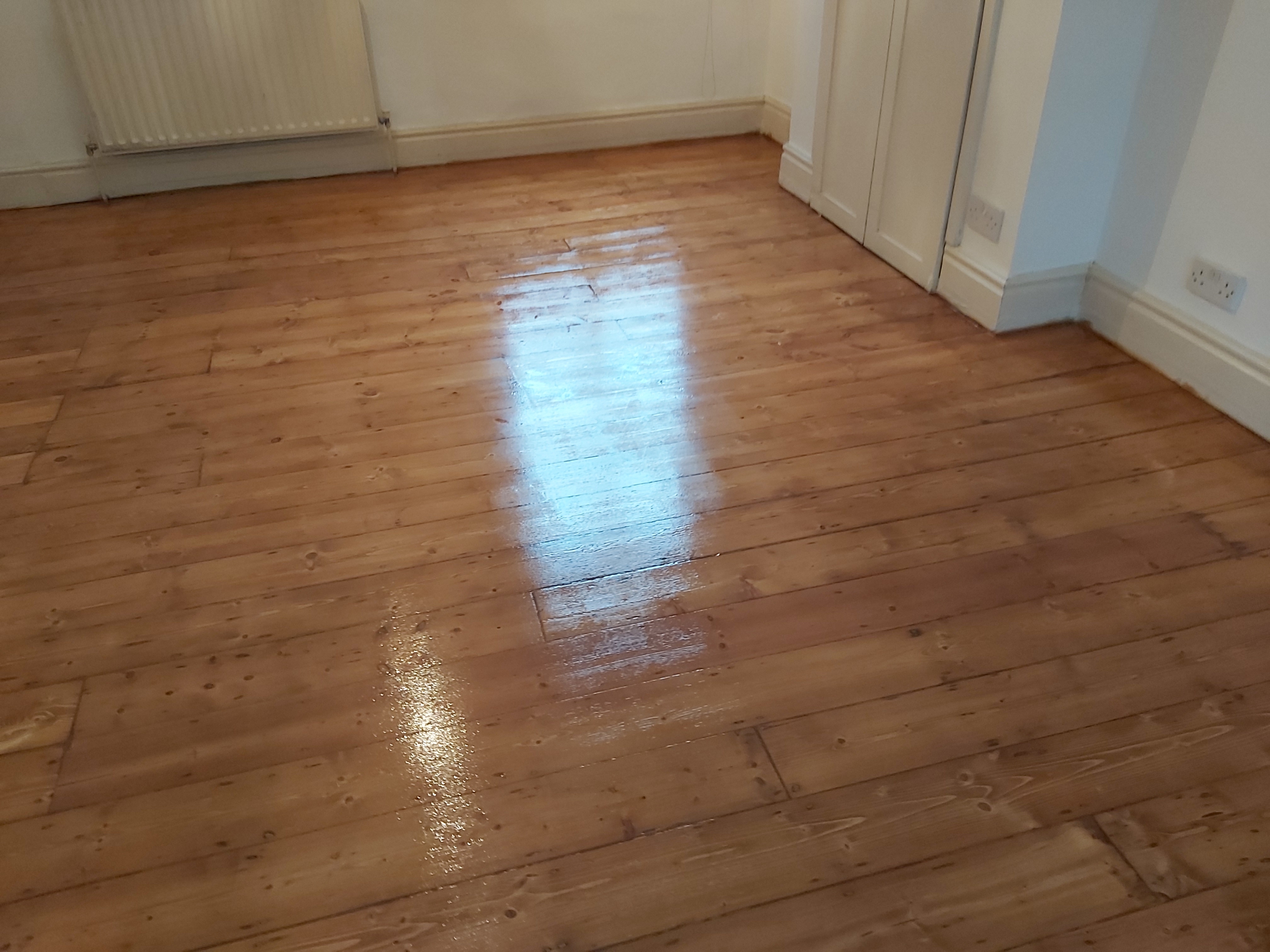 Floorboards floor after sanding work in SW14
