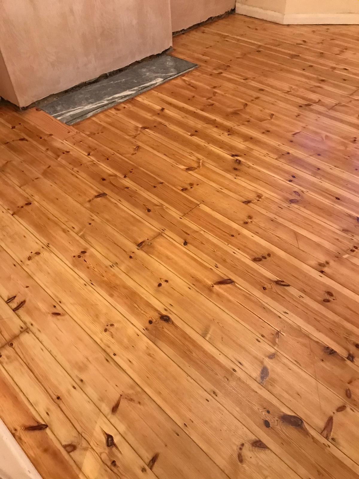 Floorboards floor after sanding work in SW16