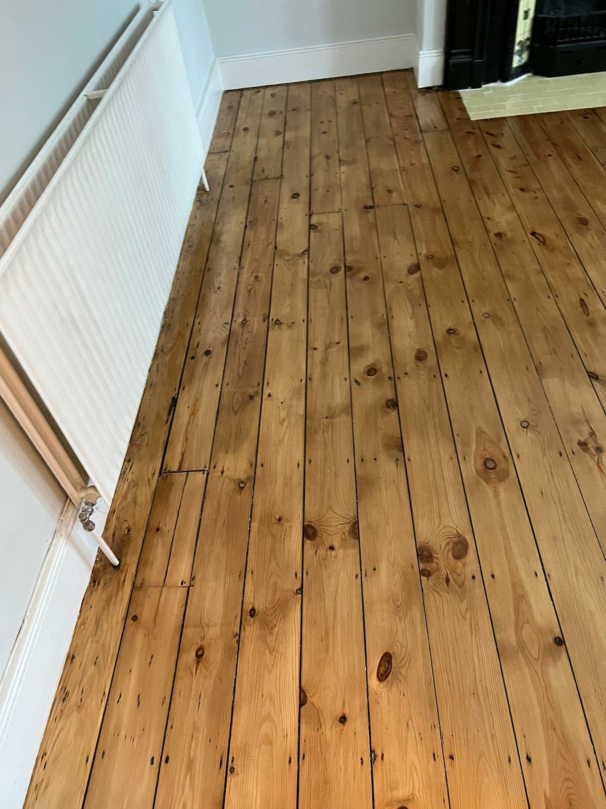 Floorboards floor after sanding work in SW16