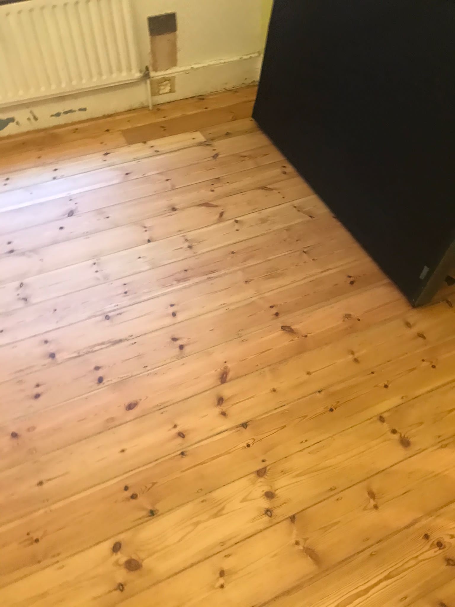 Floorboards floor after sanding work in SW17