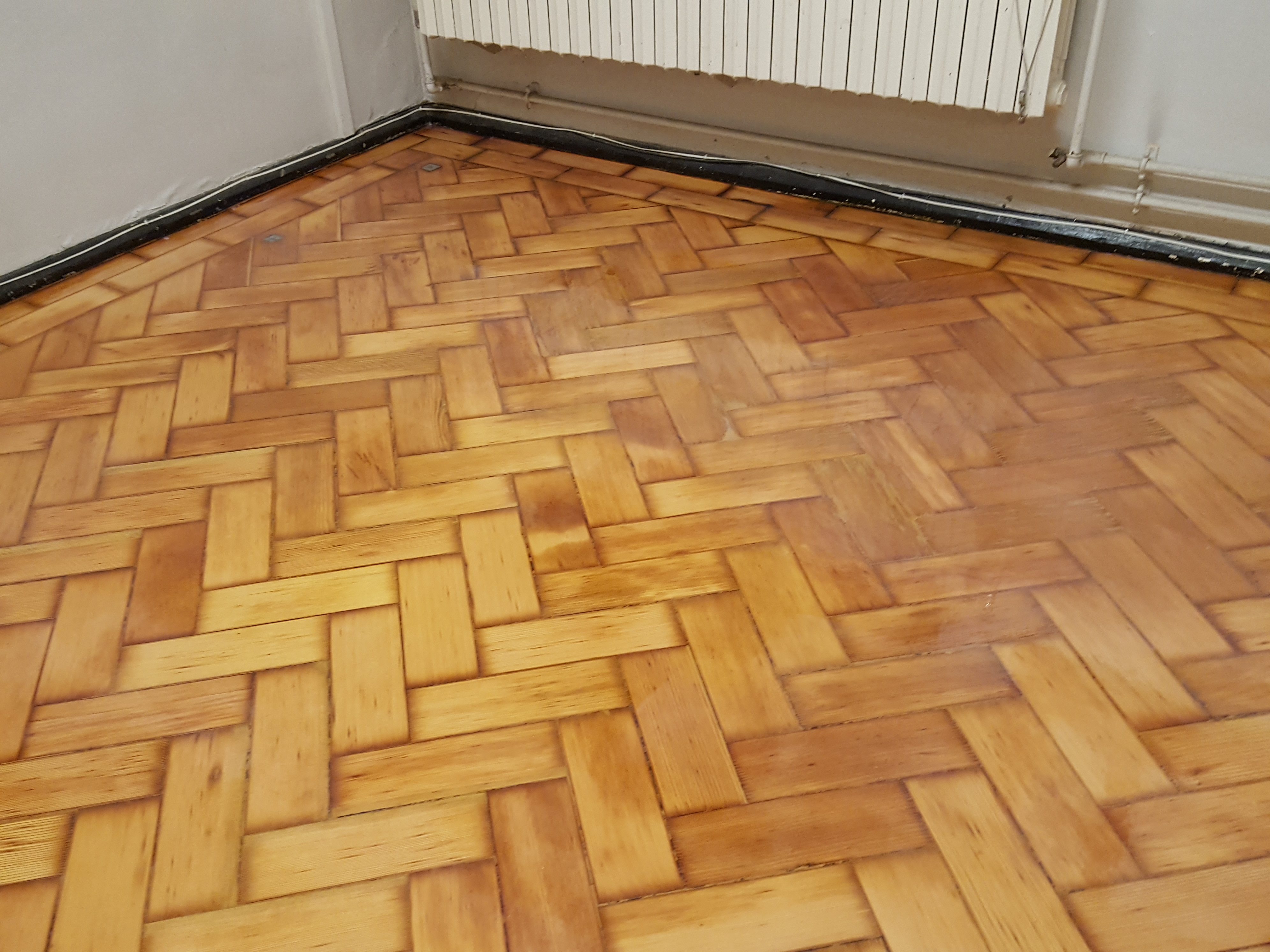 Parquet floor after sanding work in SW17