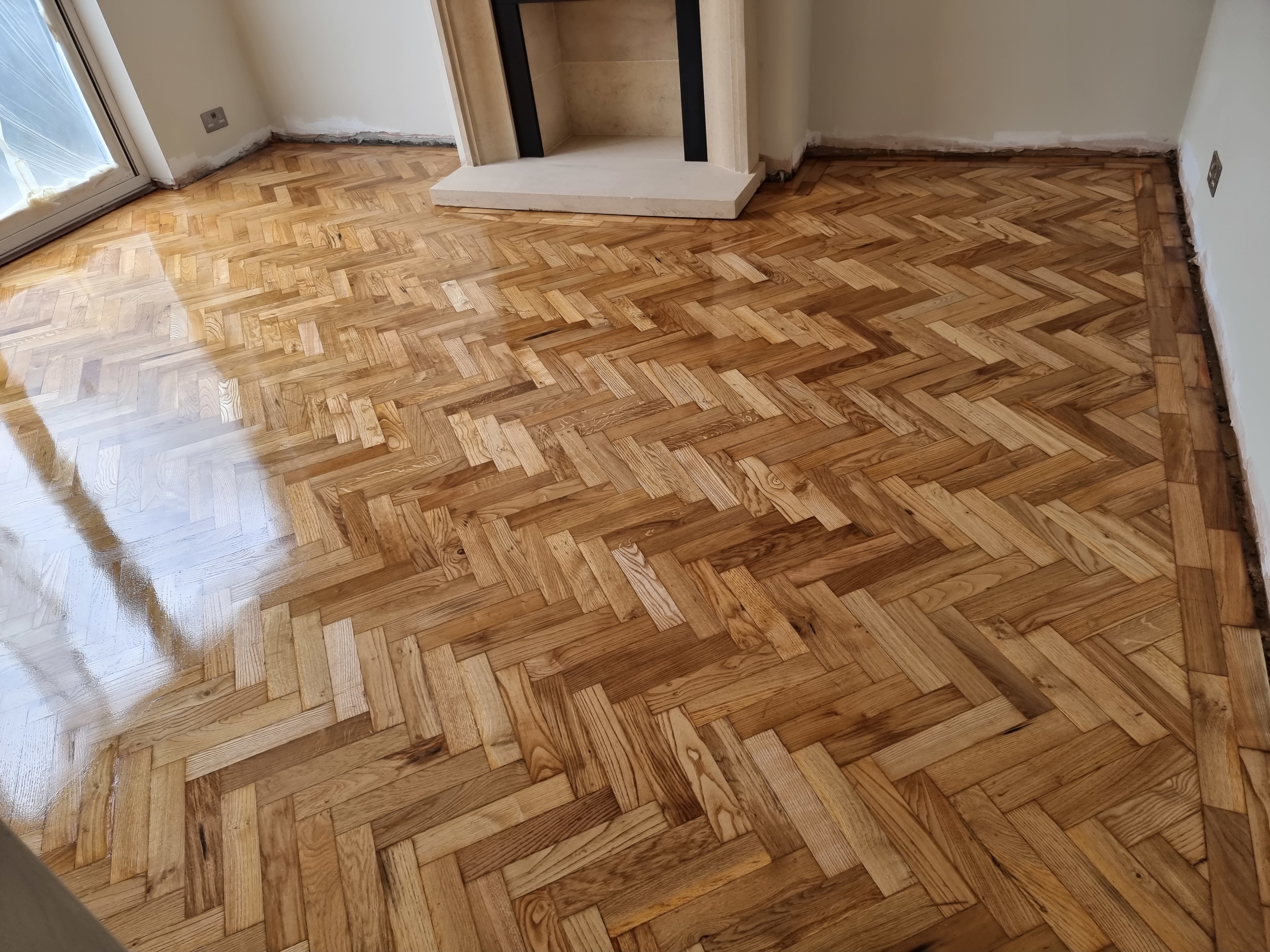 Parquet floor after sanding work in SW17