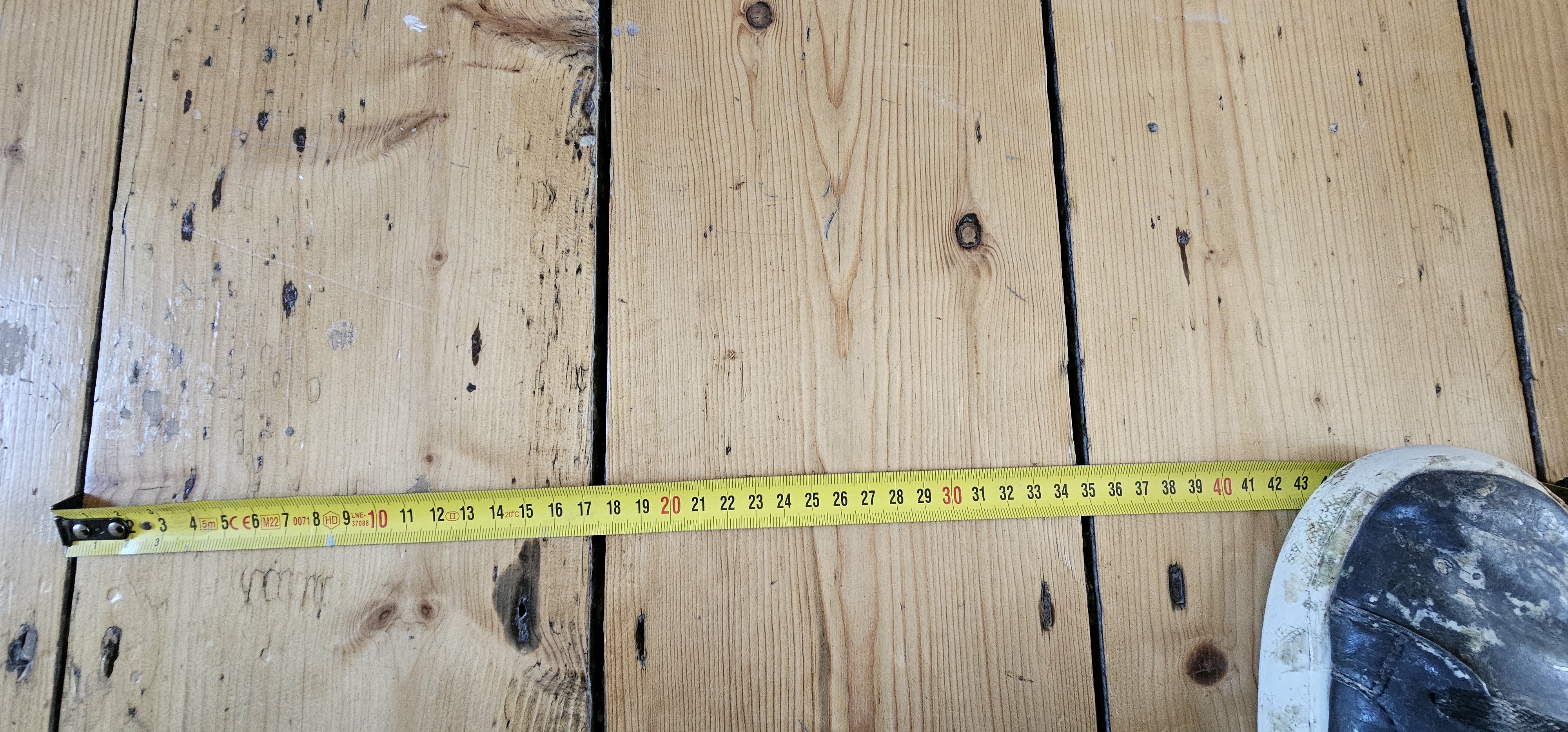 Floorboards floor after sanding work in SW18