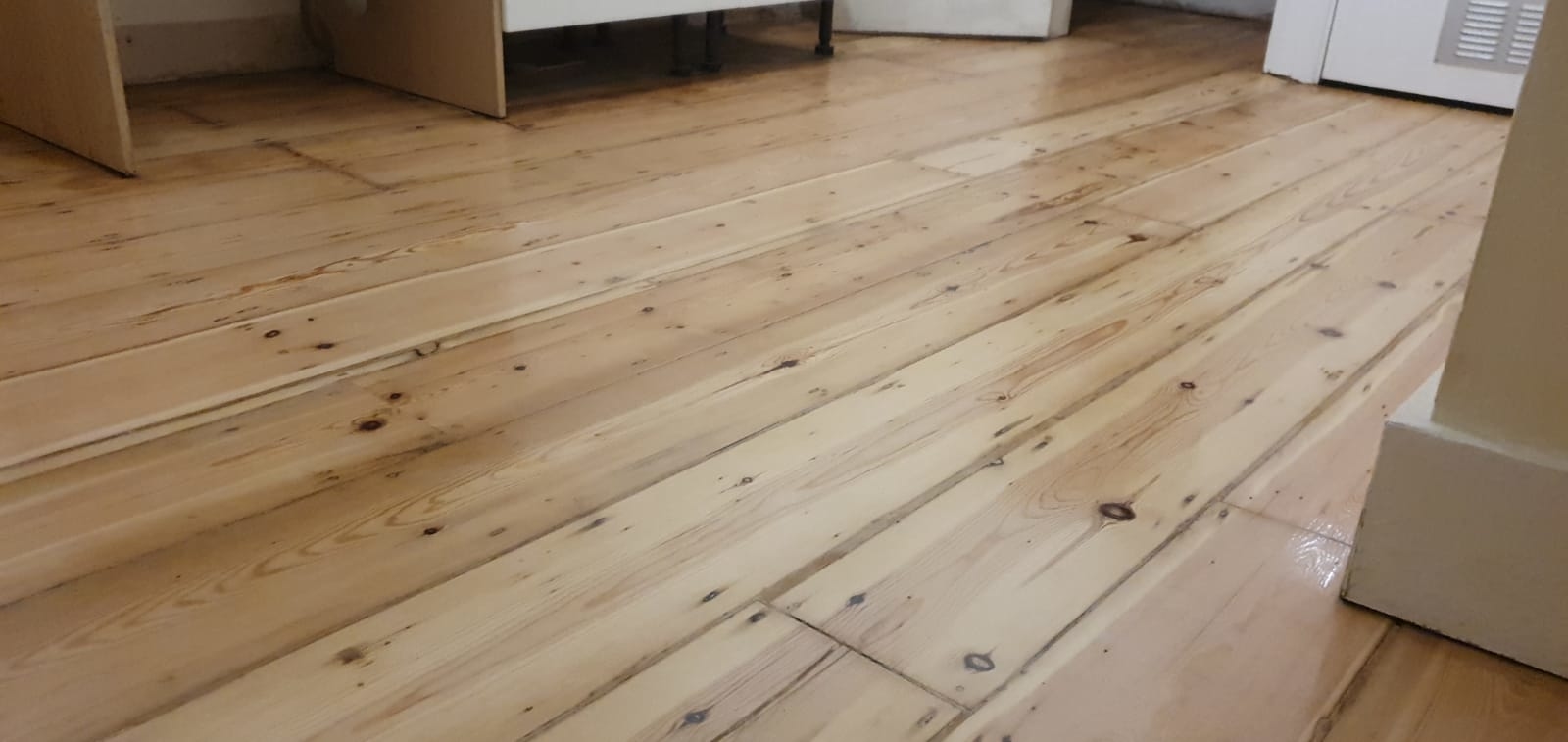 Floorboards floor after sanding work in SW2