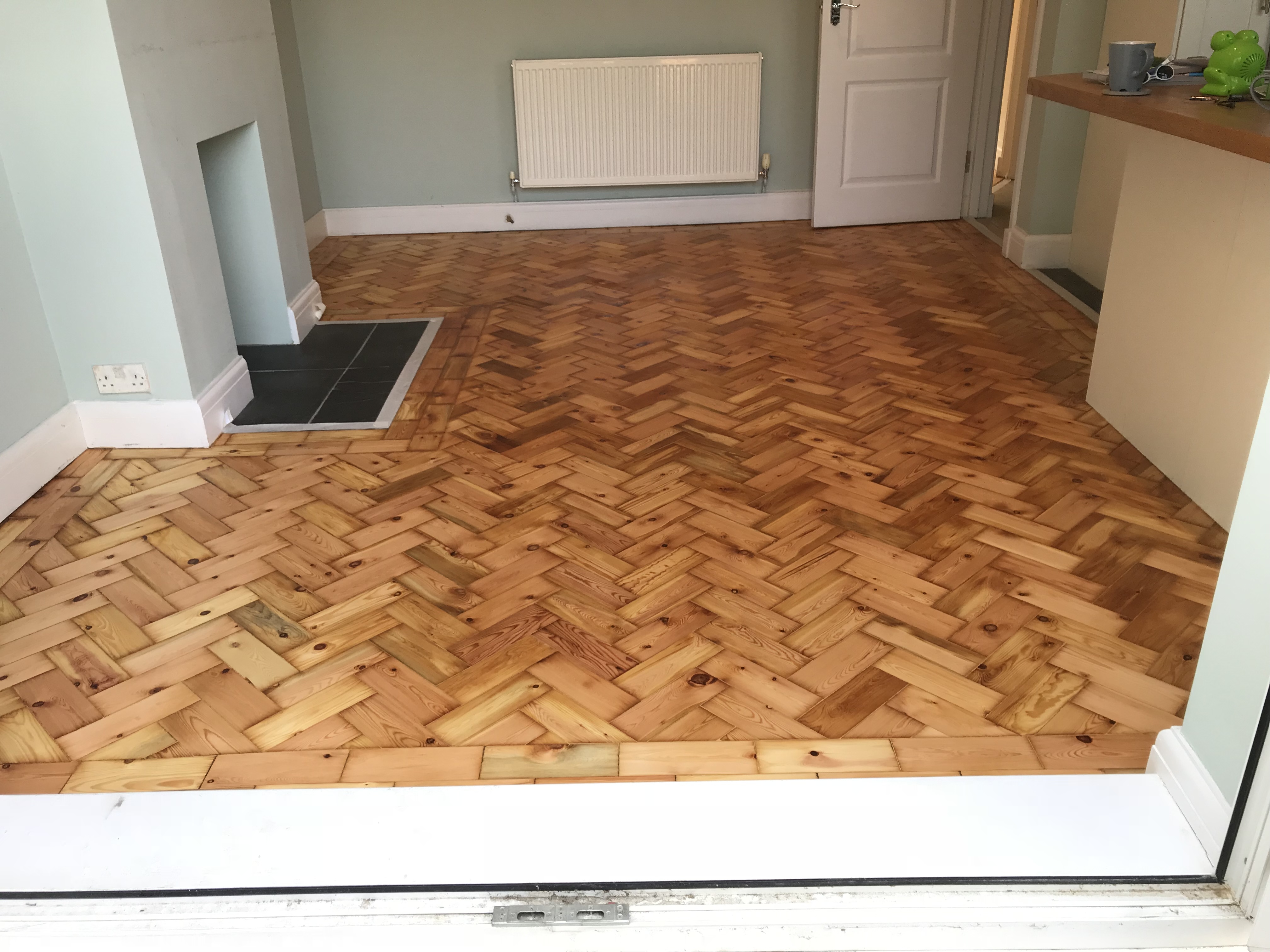Parquet floor after sanding work in SW4