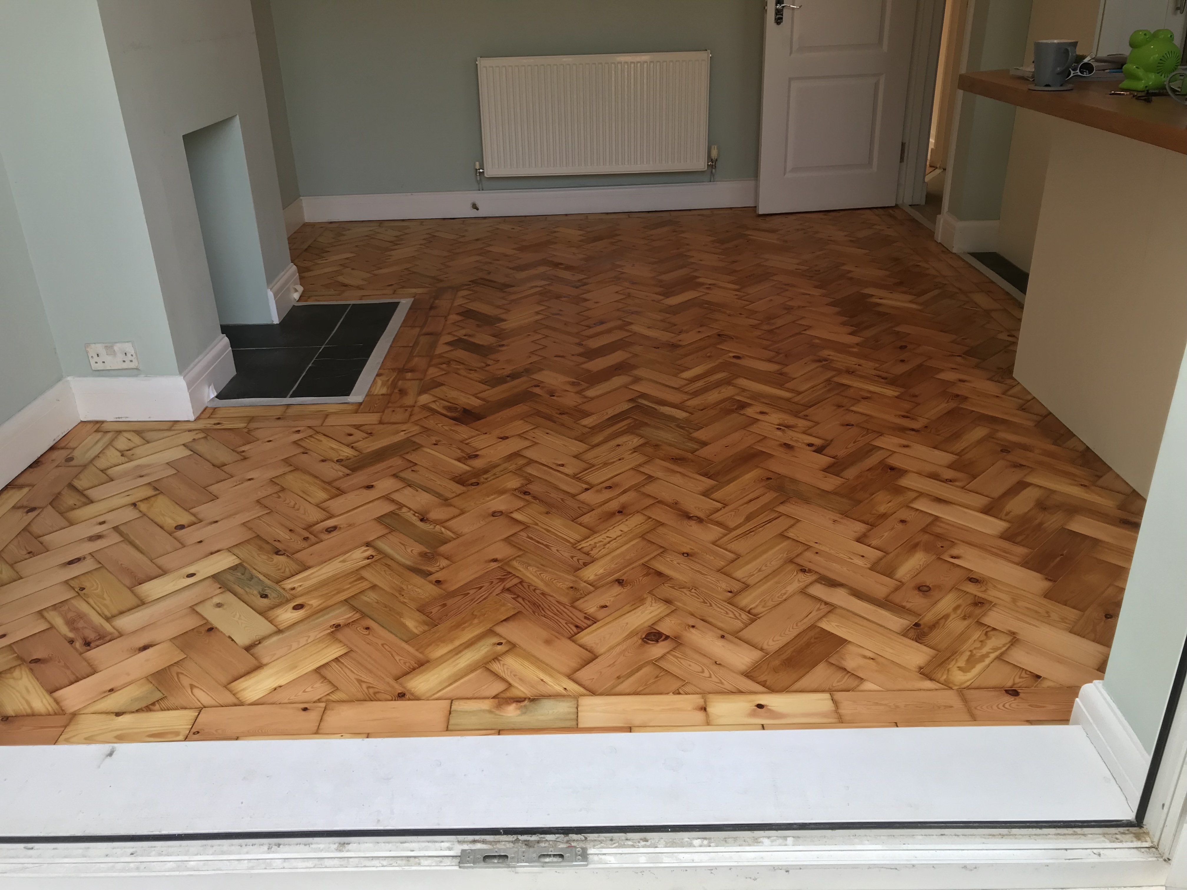 Parquet floor after sanding work in SW4