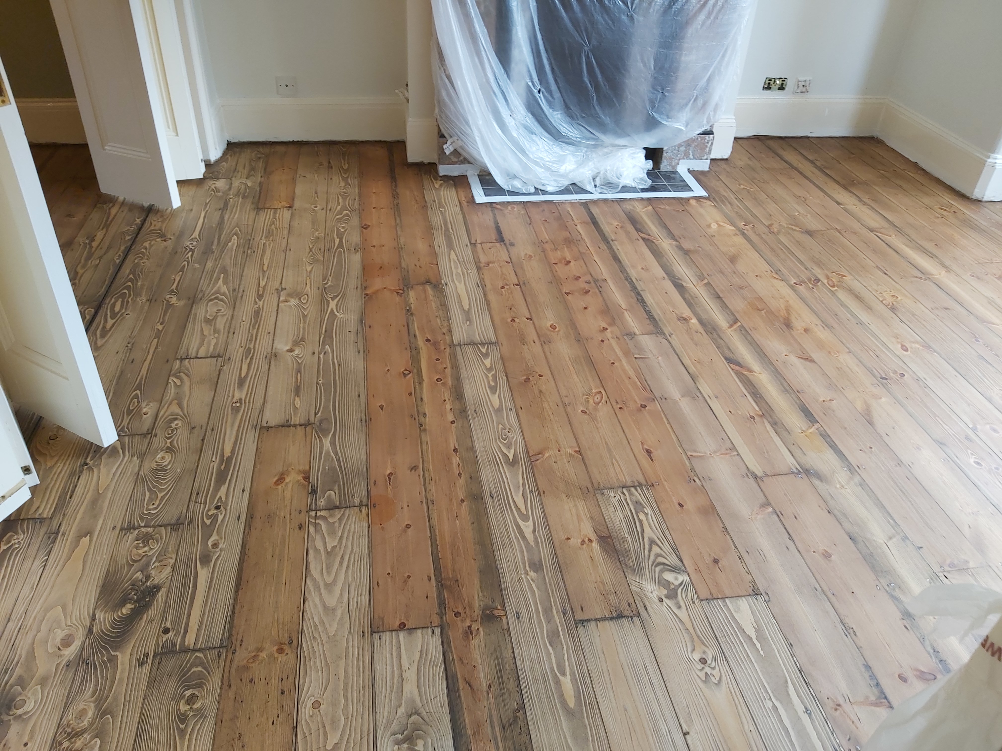 Floorboards floor after sanding work in SW6