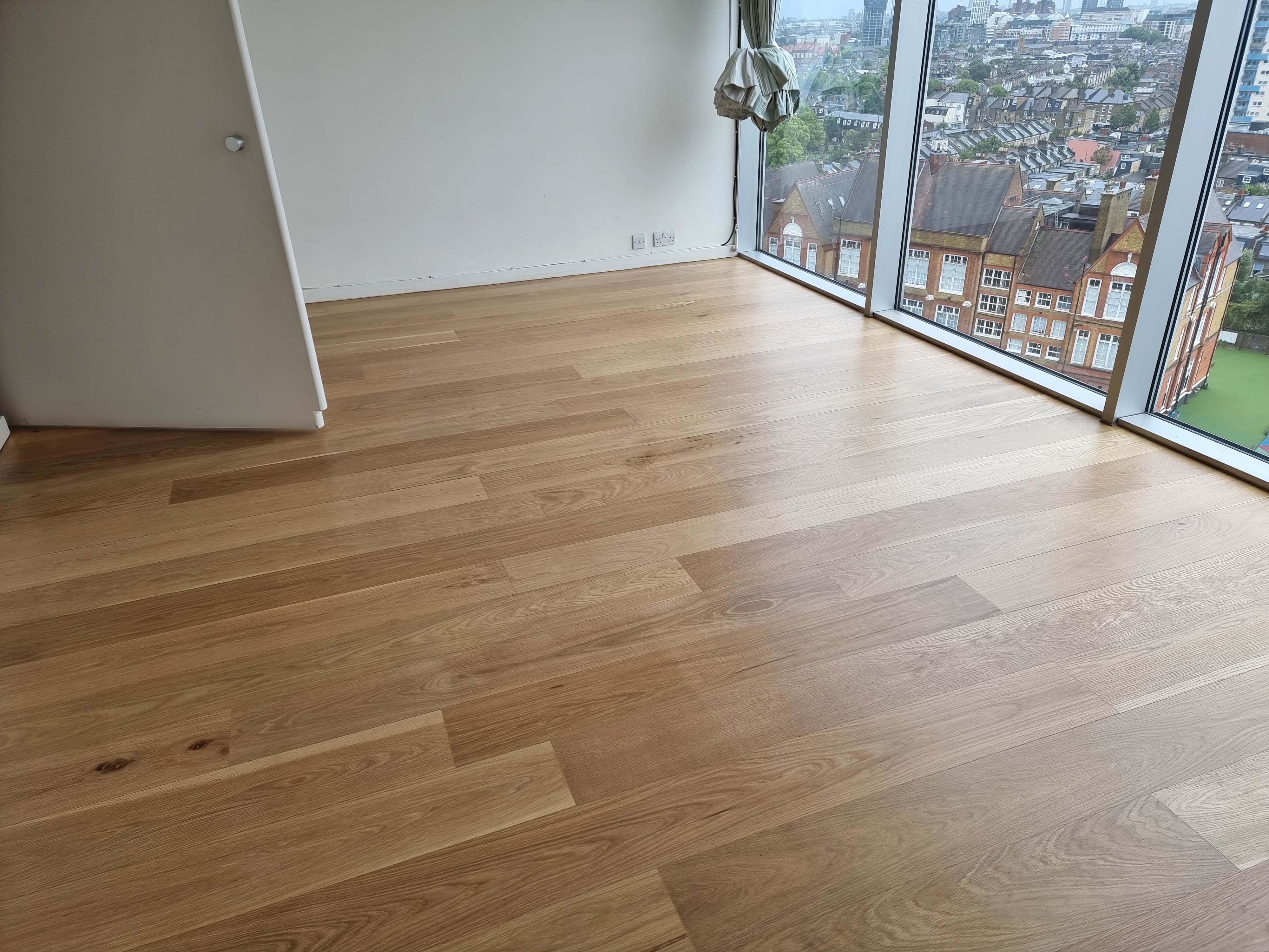 Hardwood floor after sanding work in SW6